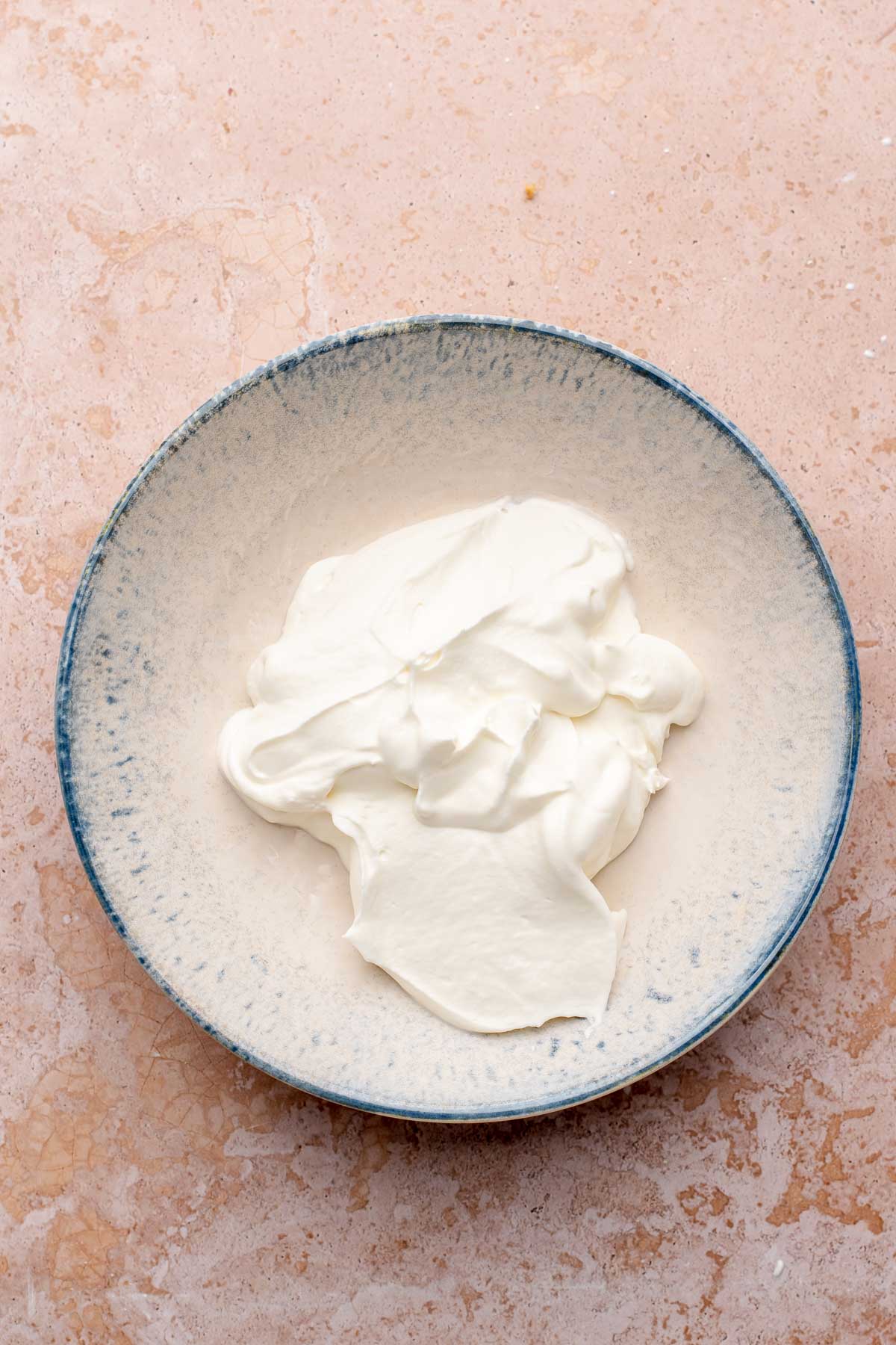 Whipped cream in a bowl.