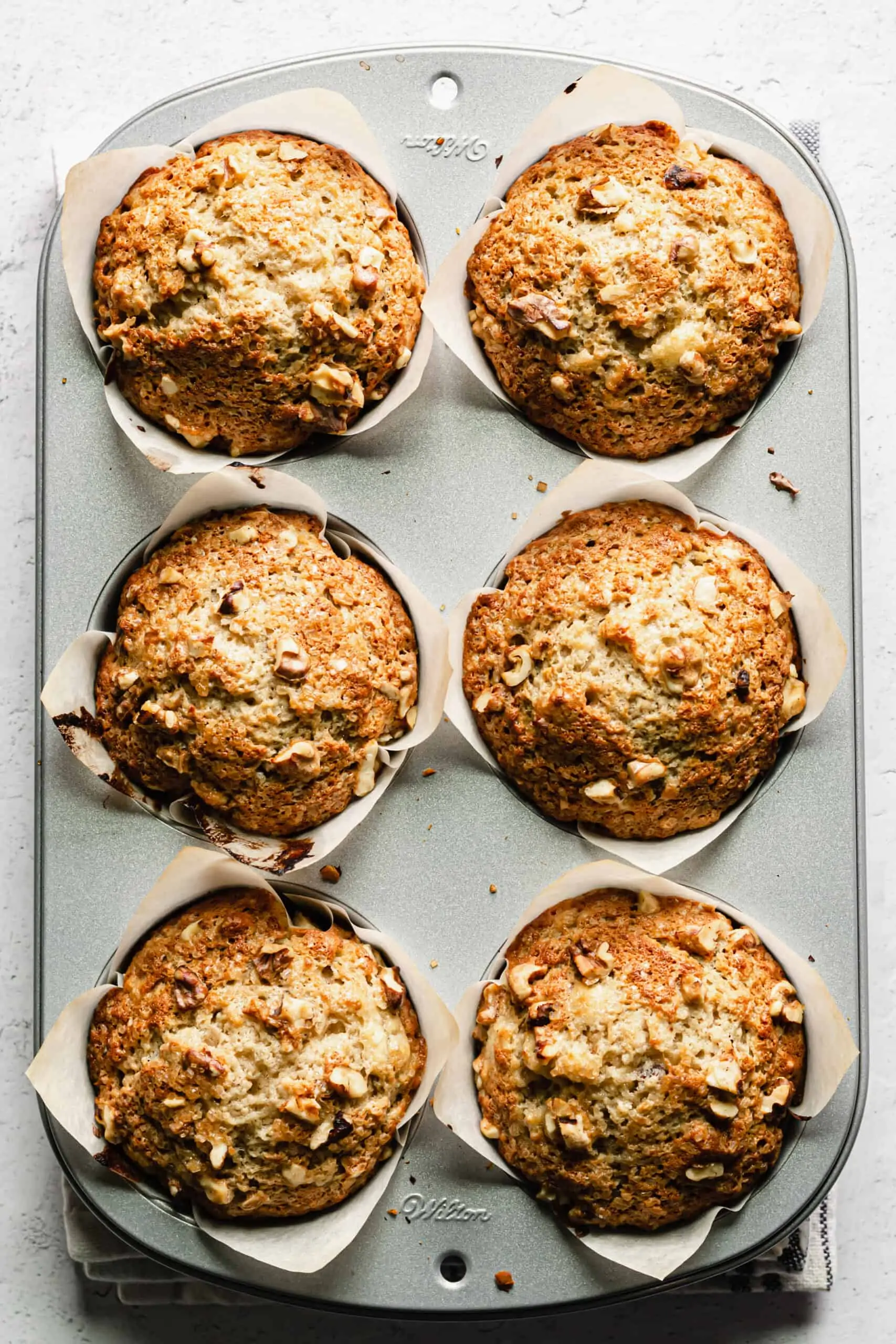 Baked banana nut muffins in the muffin pan.