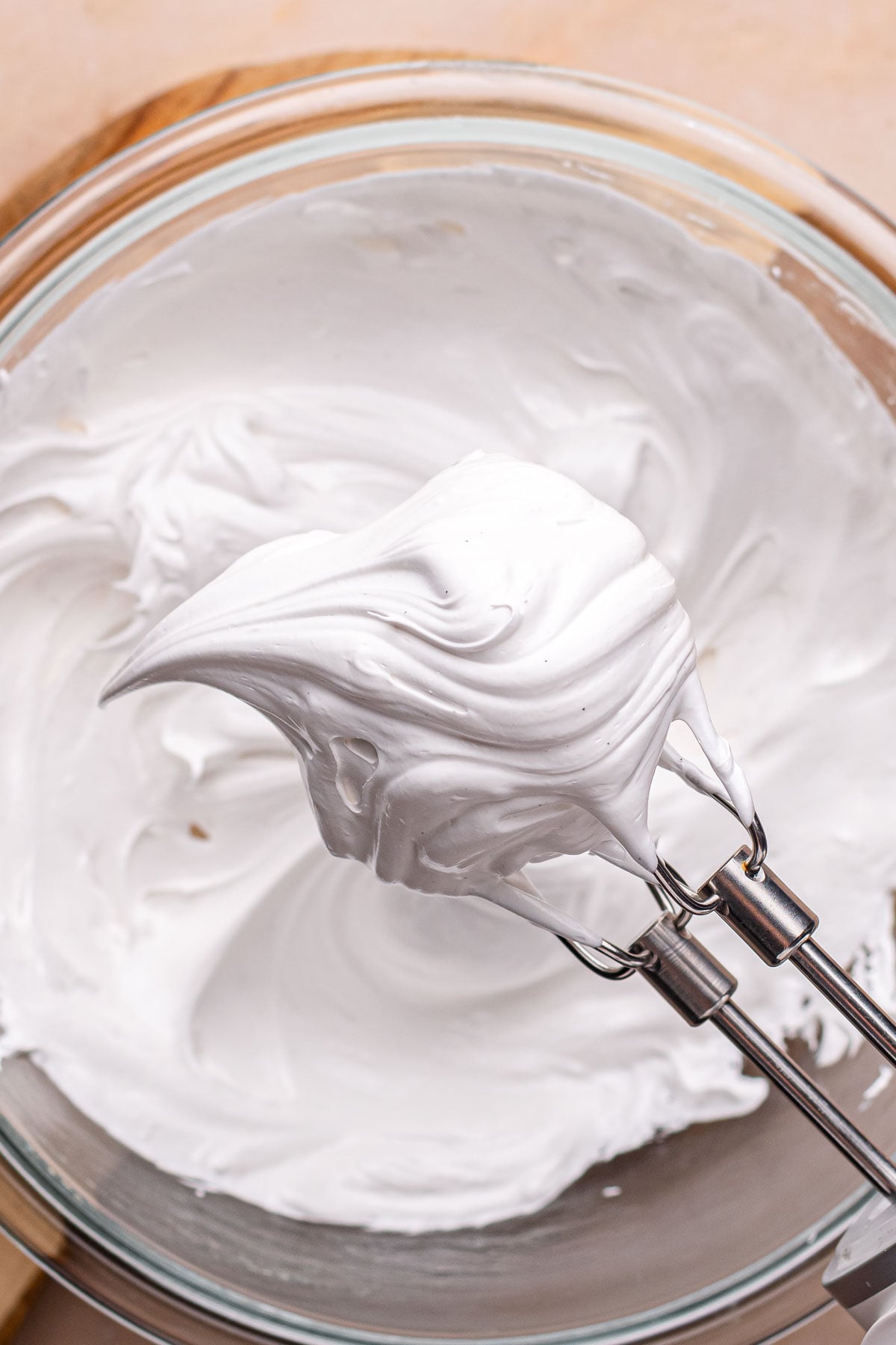 Beaters hold stiff meringue peaks on their tips.