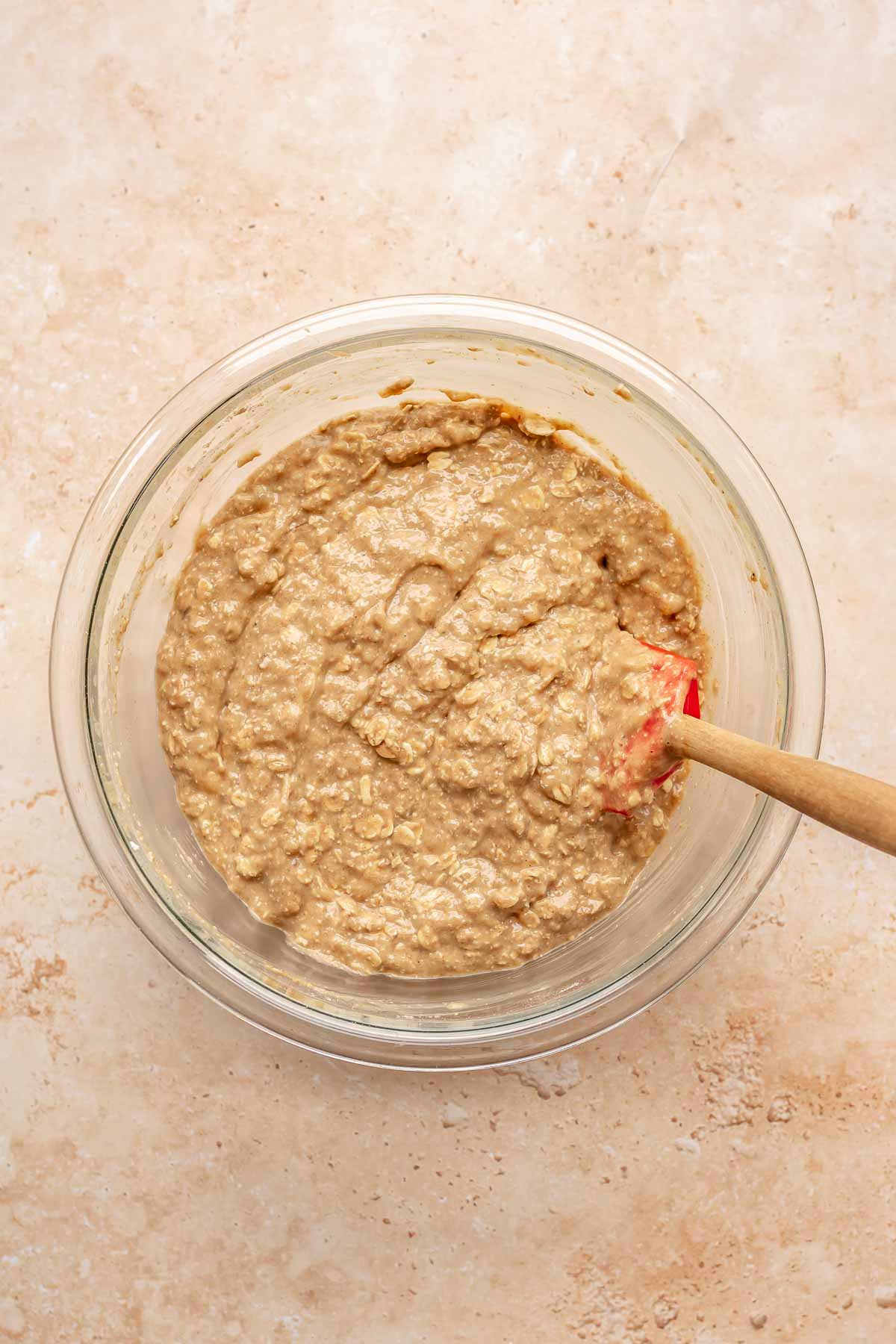 Oats added to the batter in a bowl.