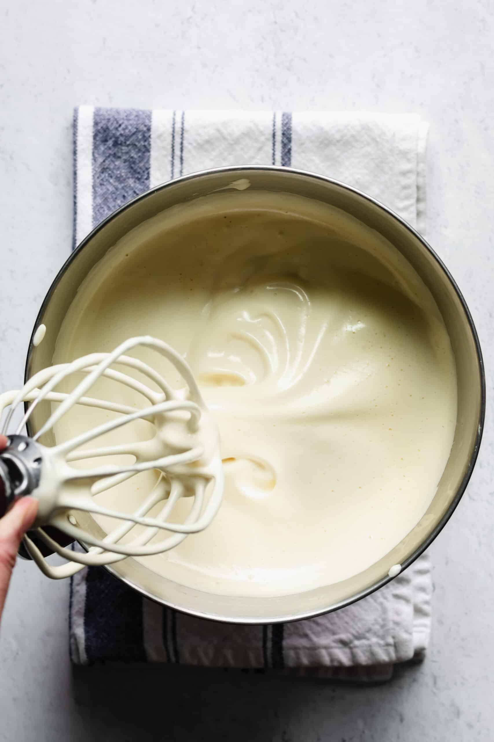 Ribbon of batter flowing off of a whisk