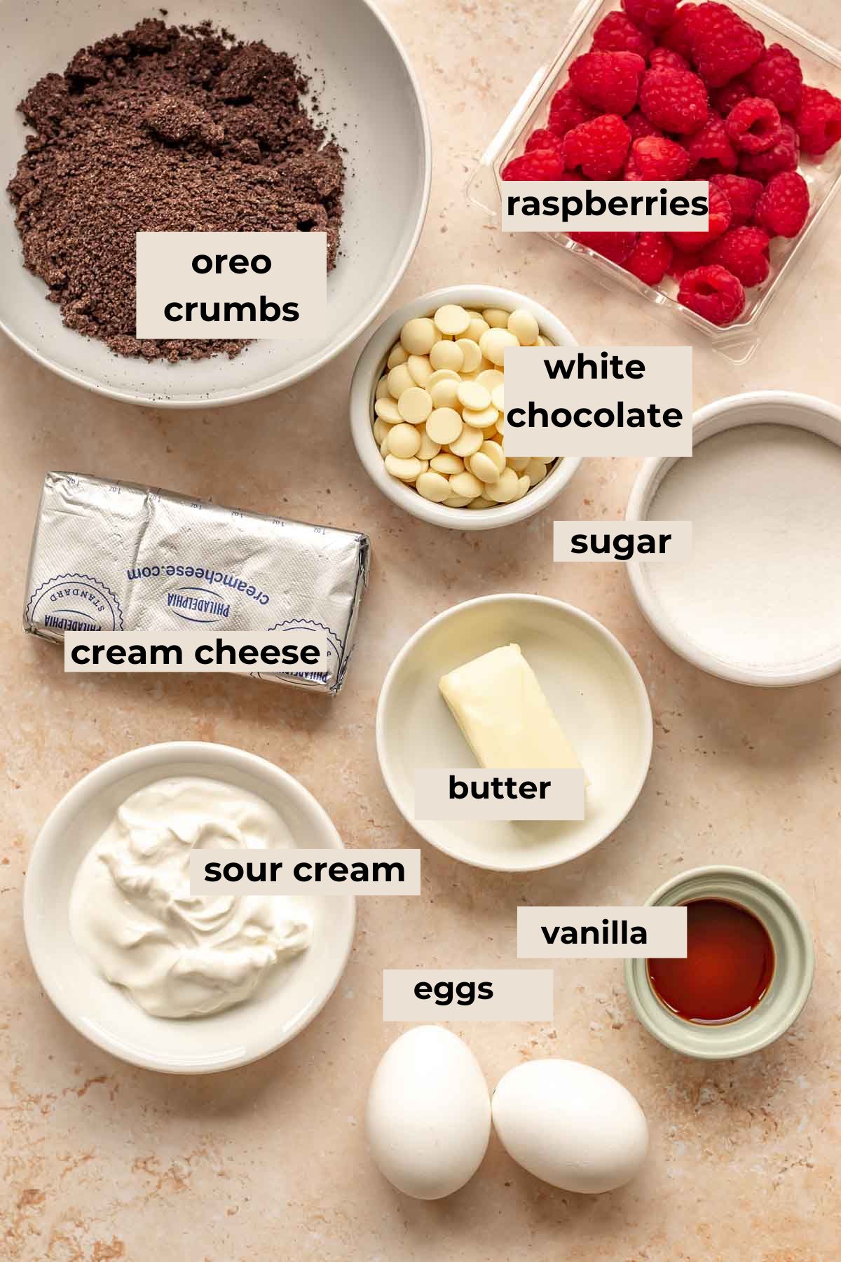 Ingredients for white chocolate raspberry cheesecake bars.