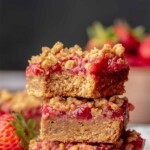 A stack of pbj bars. The stop bar has a bite removed.