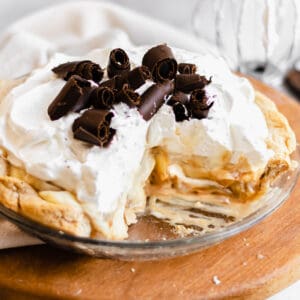 Banoffee Cream Pie with a slice removed to show the inside layers