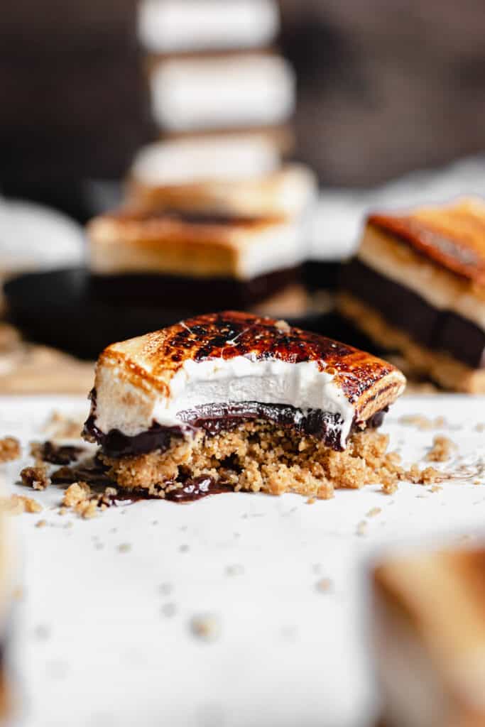 straight on shot of a smores bar with a bite removed