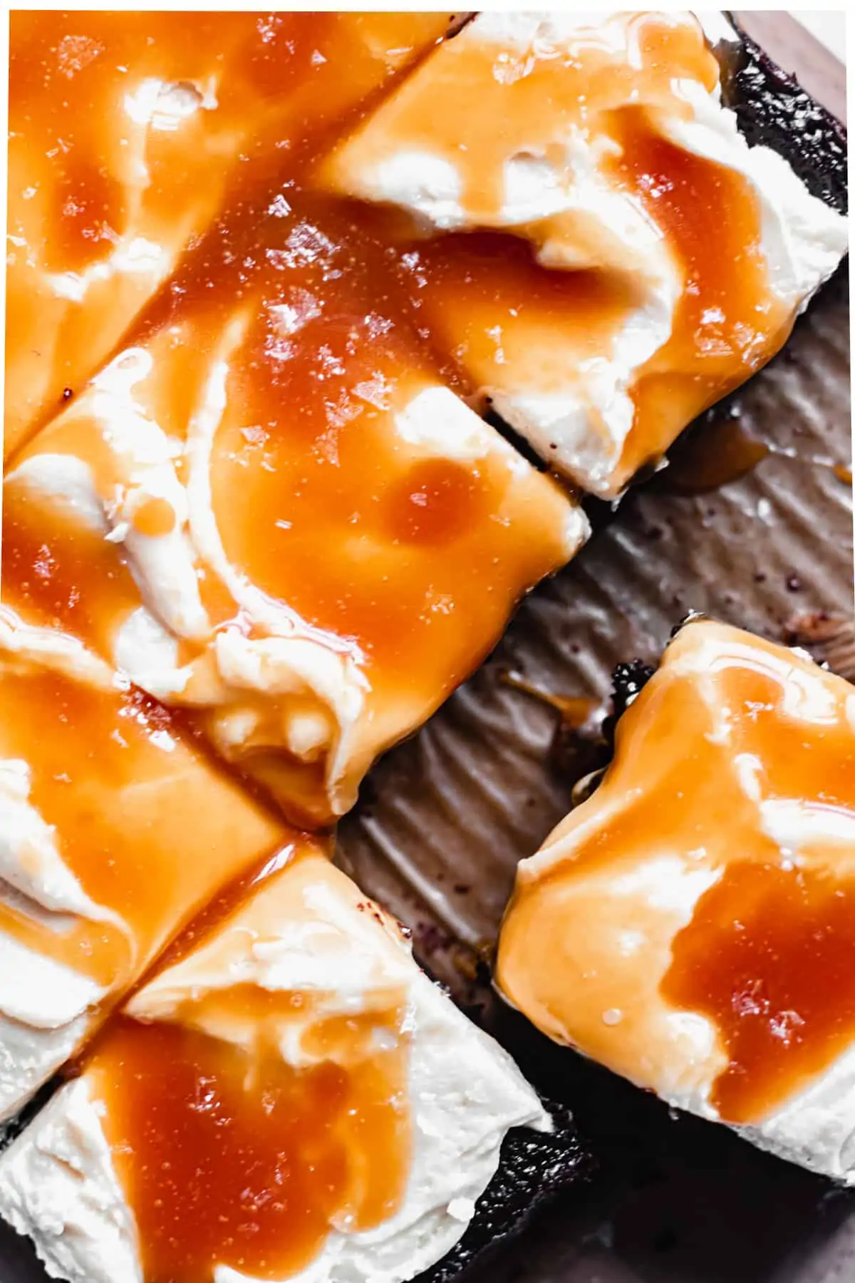 Overhead shot of cut snack cake with caramel on top
