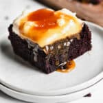 Slice of Chocolate Snack Cake with caramel dripping over the side