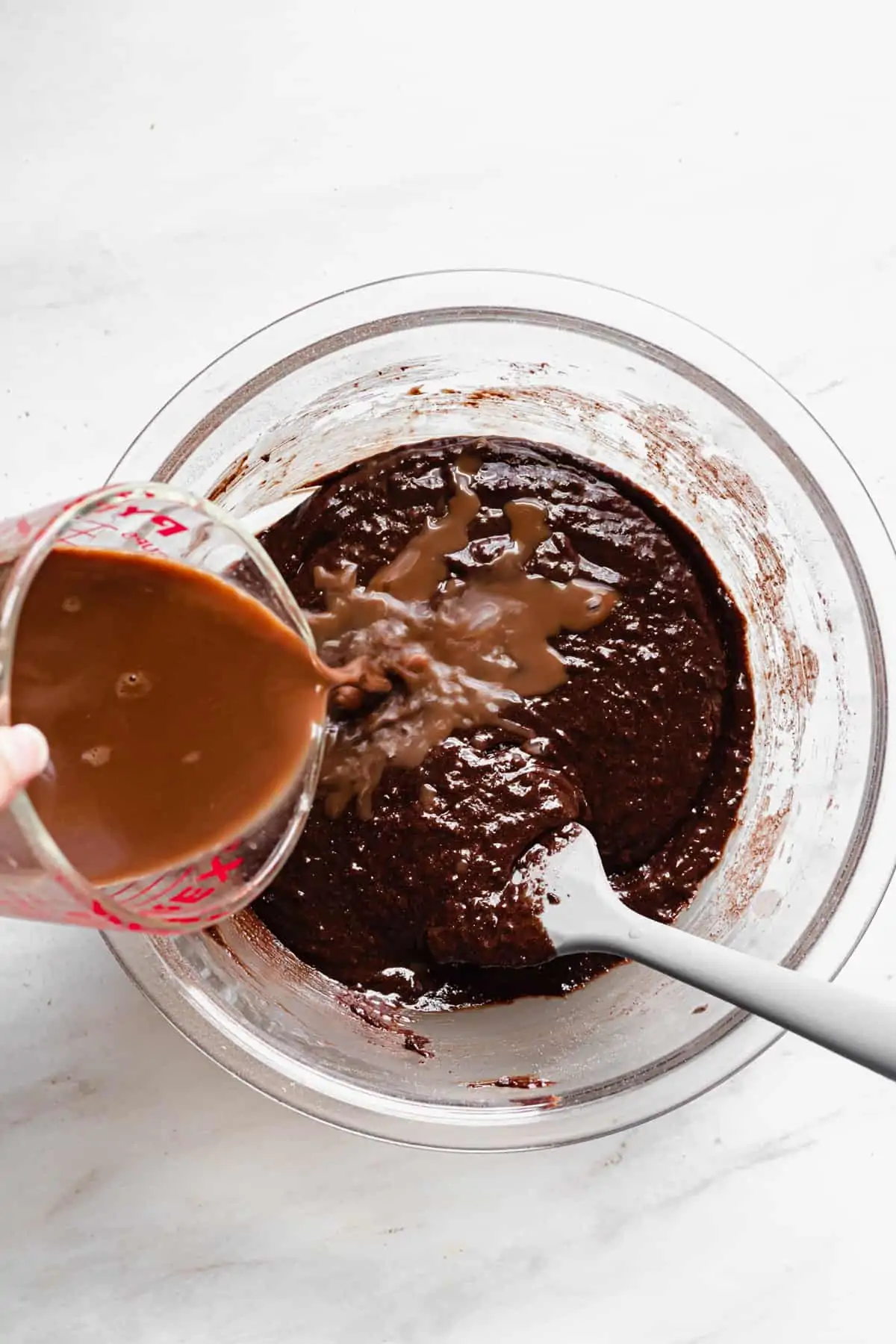 Coffee being poured into batter