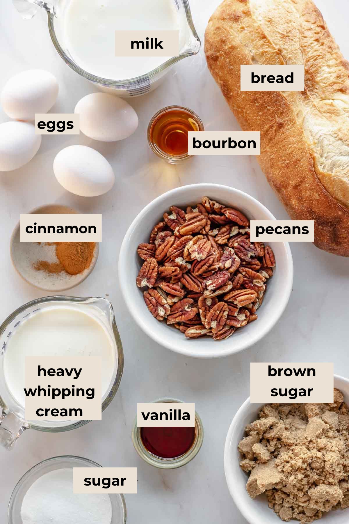 Ingredients for pecan bread pudding with vanilla sauce.