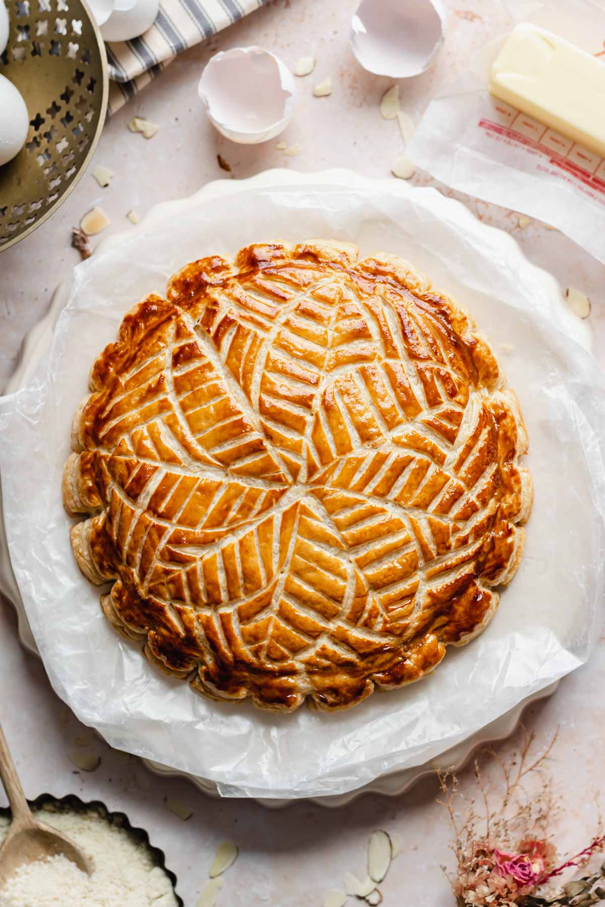 Overhead shot of a baked galette des rois to showcase the design.