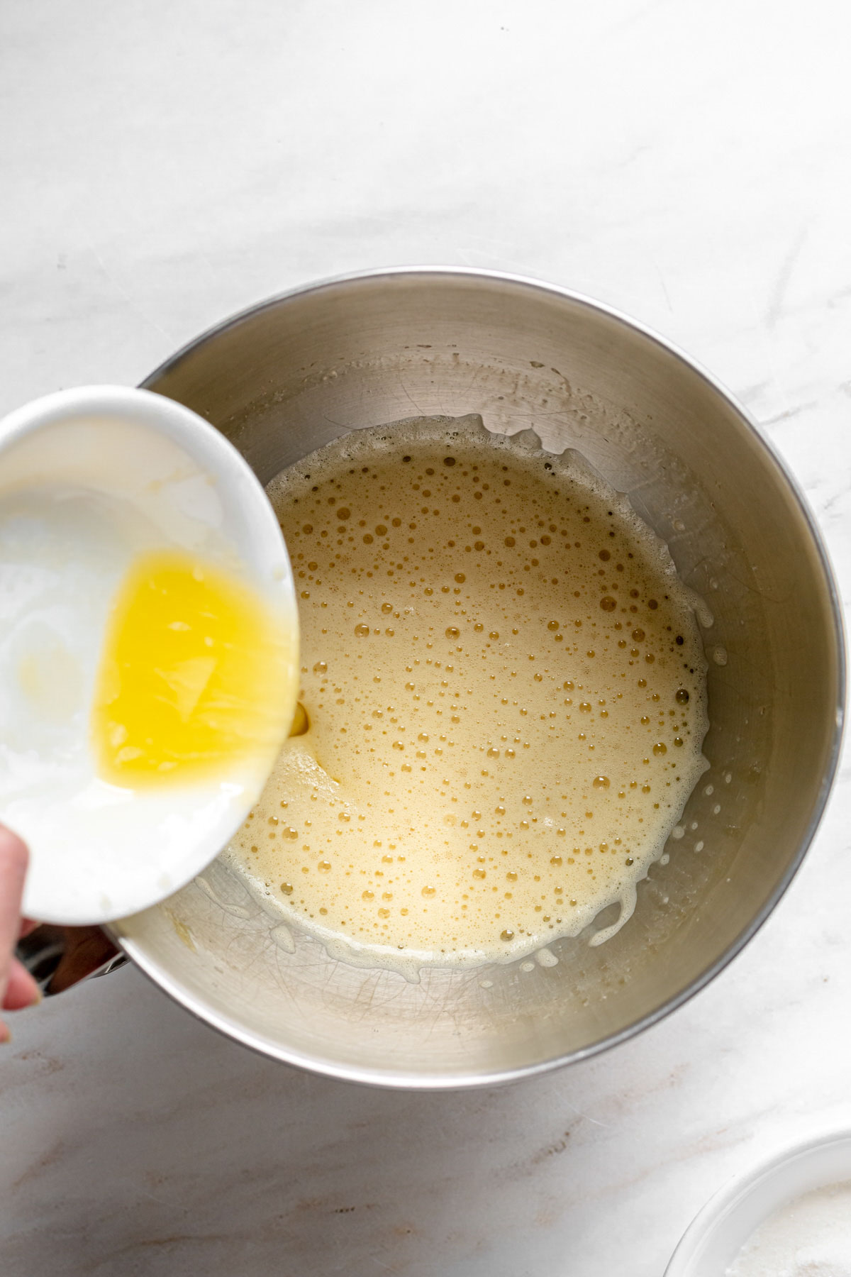 Butter added into eggs.