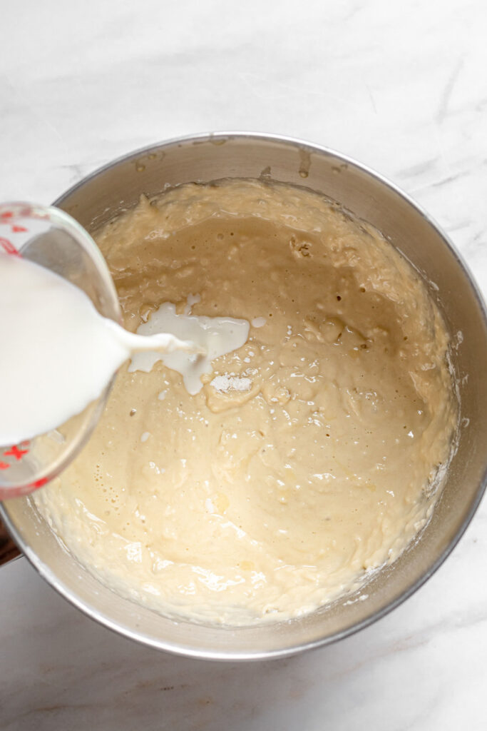 Milk being added to the batter.