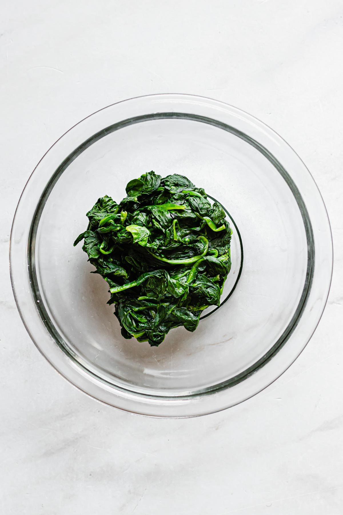 Ball of spinach in a bowl.