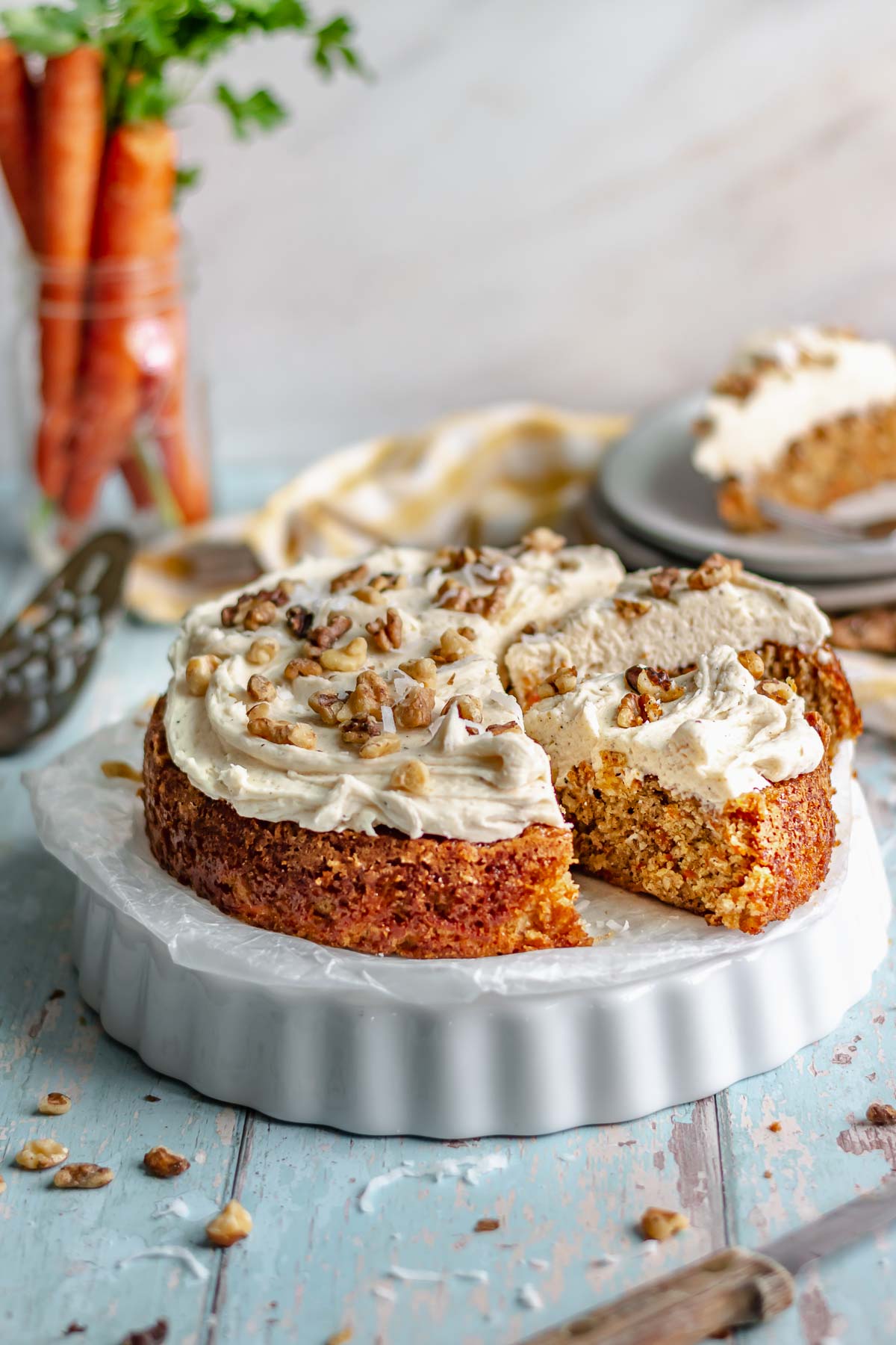 Carrot snack cake sits on a serving dish..