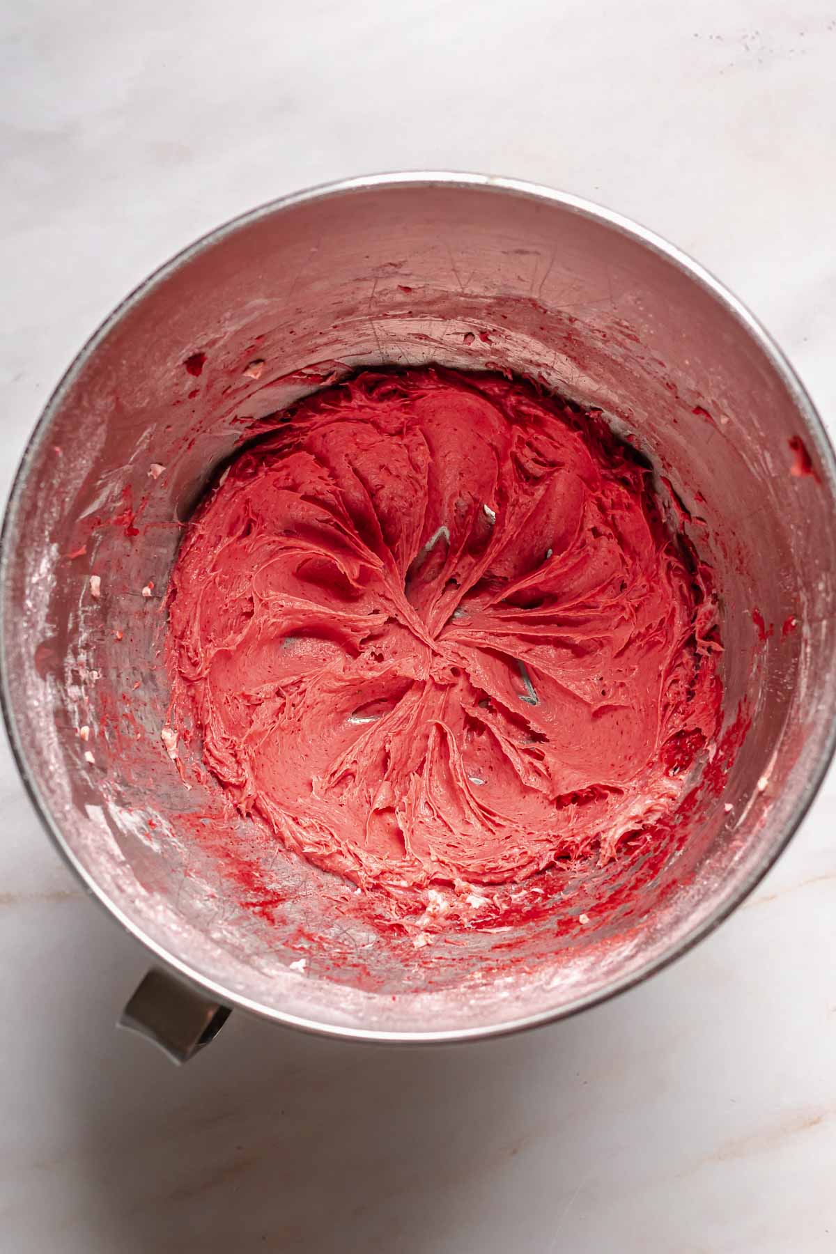Freeze dried strawberry frosting in a bowl.