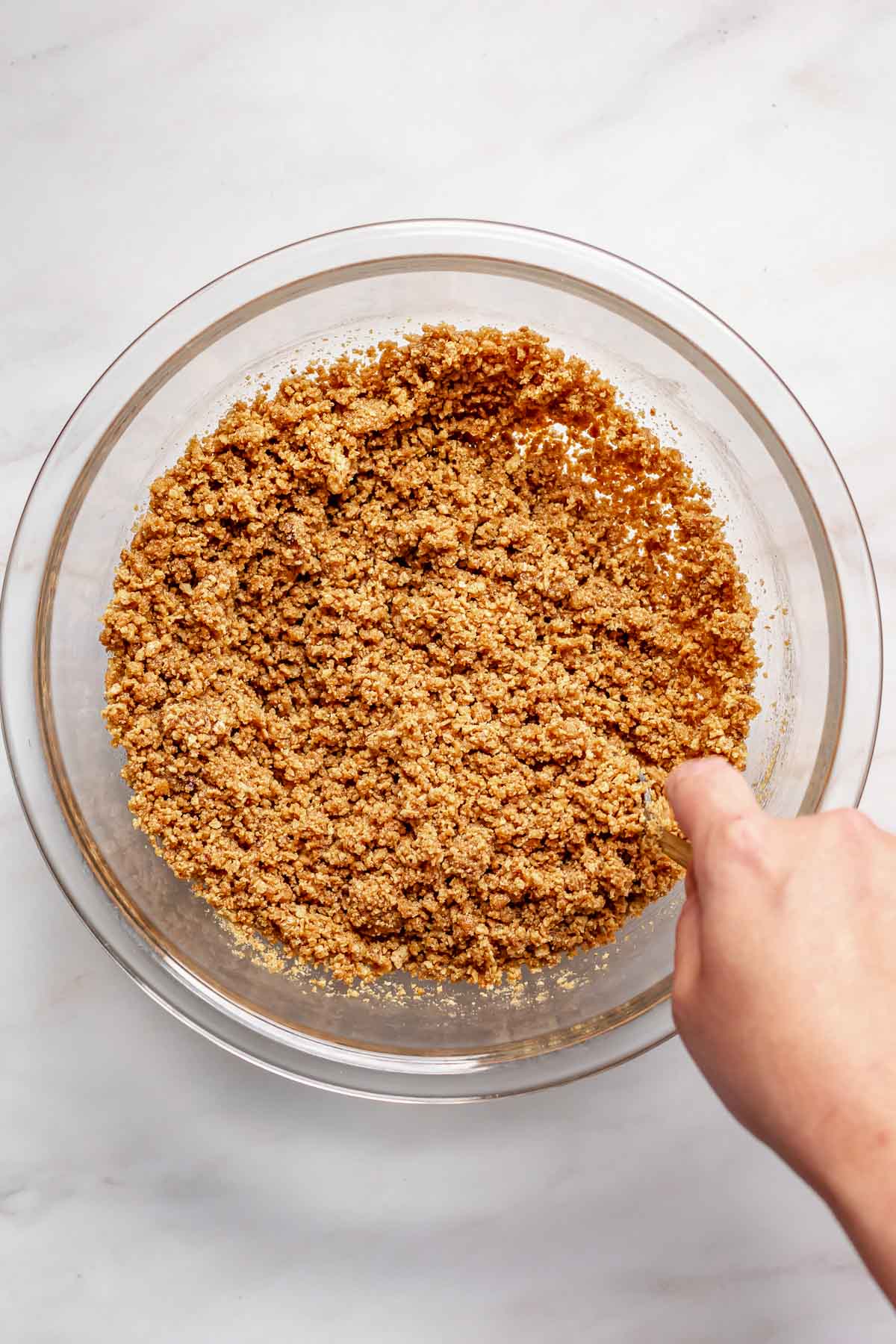 Graham cracker crumbs mixed in a bowl.