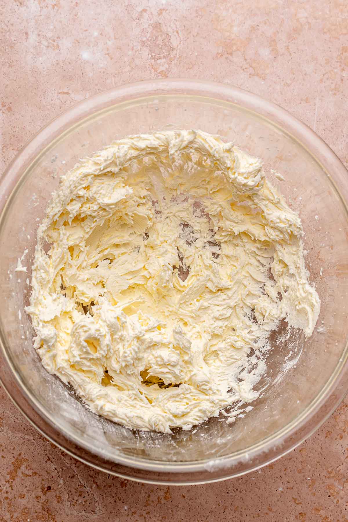 Creamed butter and sugar in a bowl.