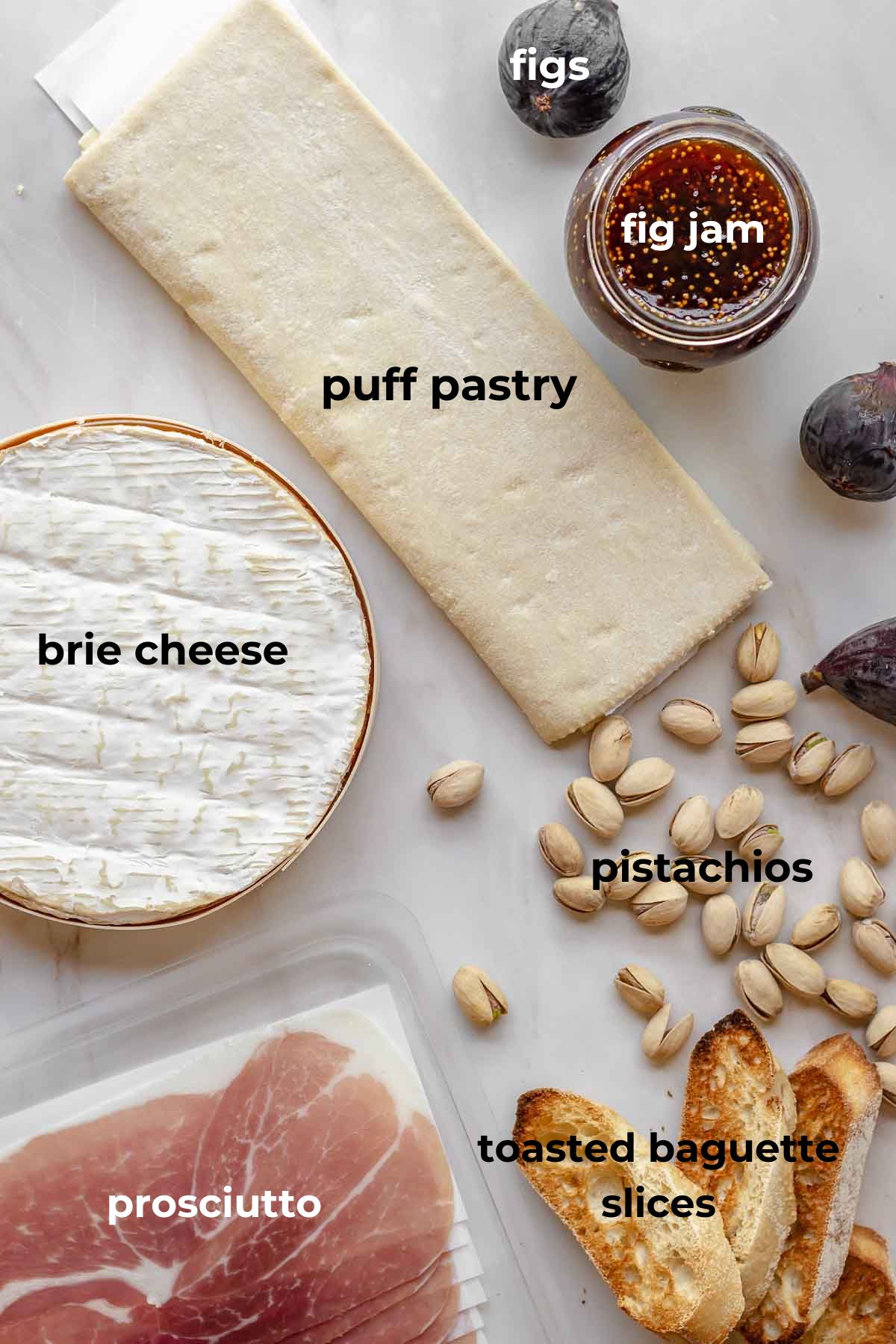 Ingredients for baked brie with fig jam.
