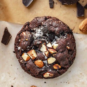 Almond chocolate cookie with chocolate surrounding it.
