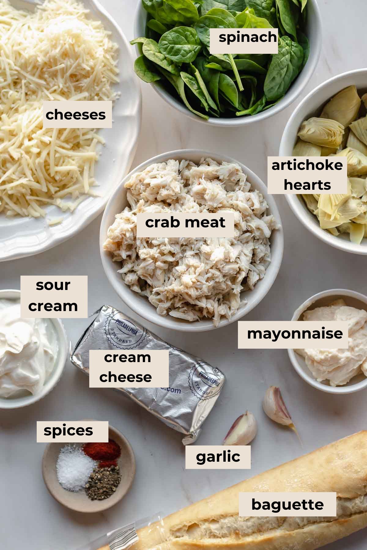 Ingredients for hot crab spinach artichoke dip.