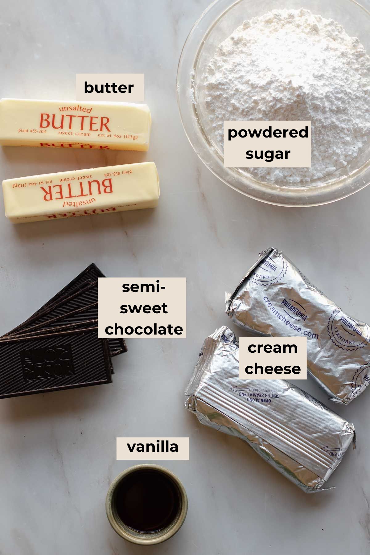 Ingredients for chocolate cake with cream cheese frosting.
