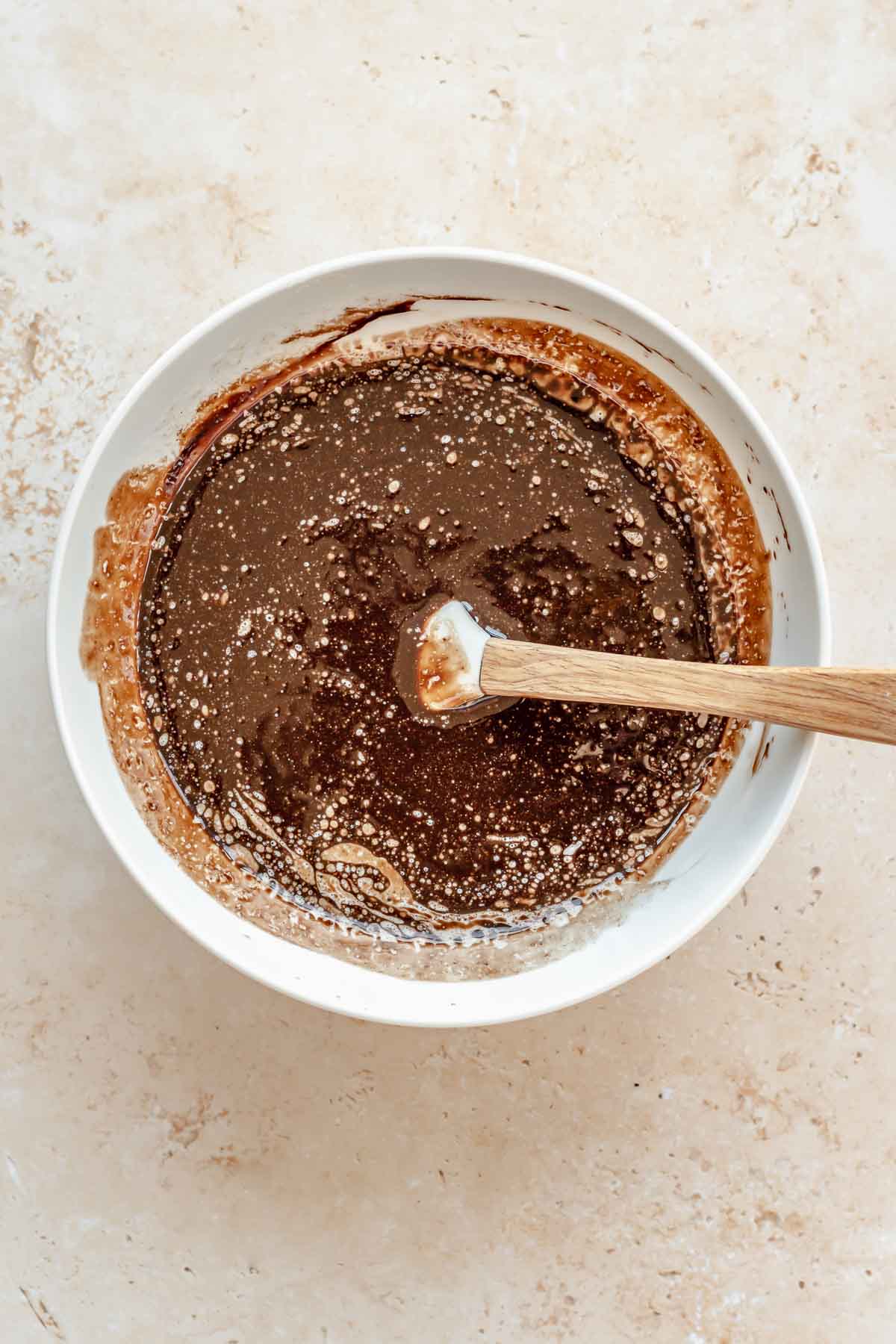 Chocolate and butter melted in a bowl.