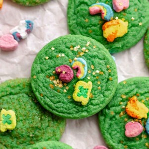 St. Patricks Day sugar cookies stacked on top of each other.