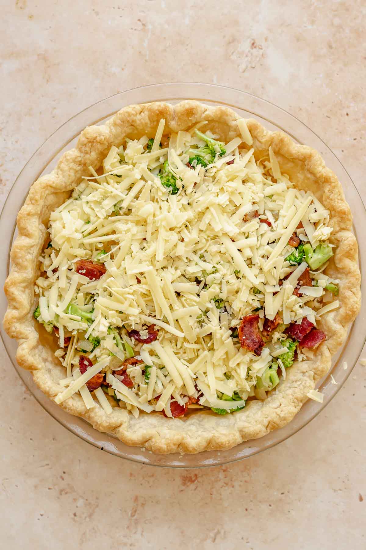 Bacon, broccoli, onion, garlic and cheese in a pie crust.