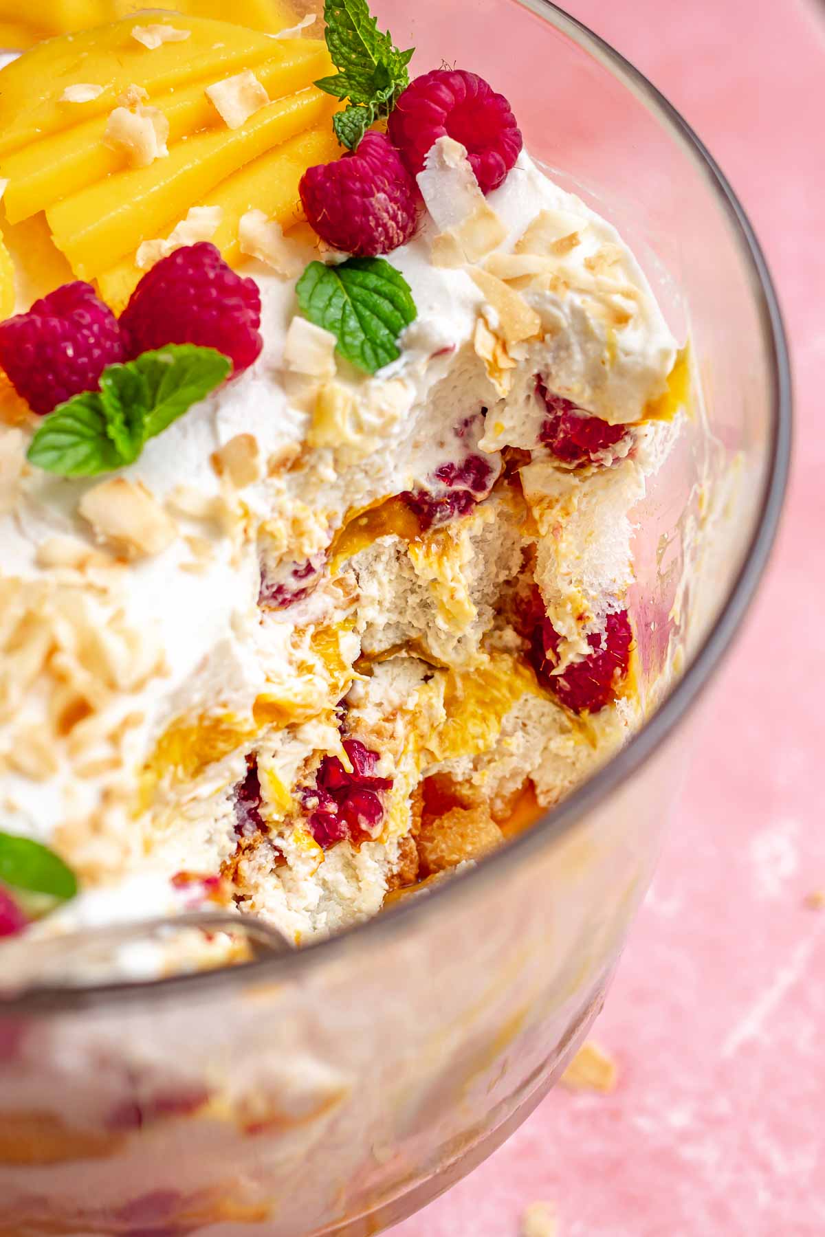 Trifle layers in the dish after a scoop is removed.