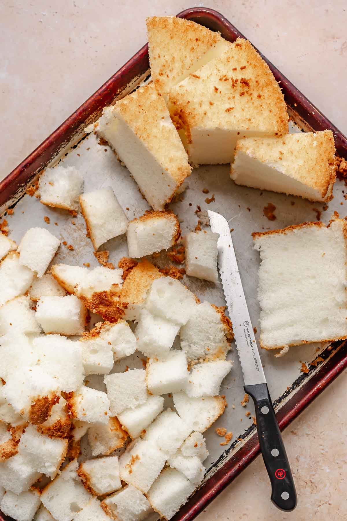 Sliced angel food cake on a board.