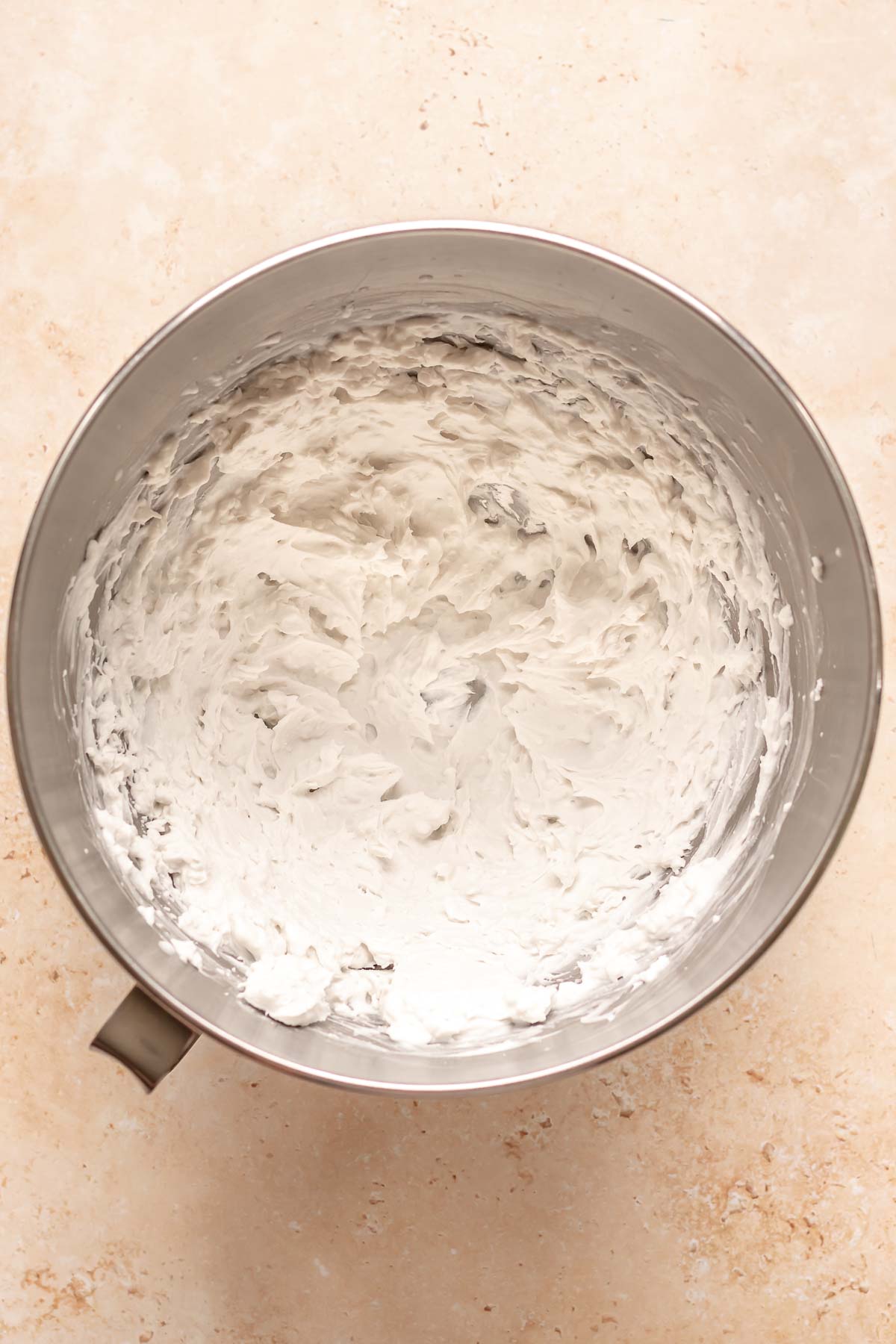 Coconut cream whipped in a bowl.