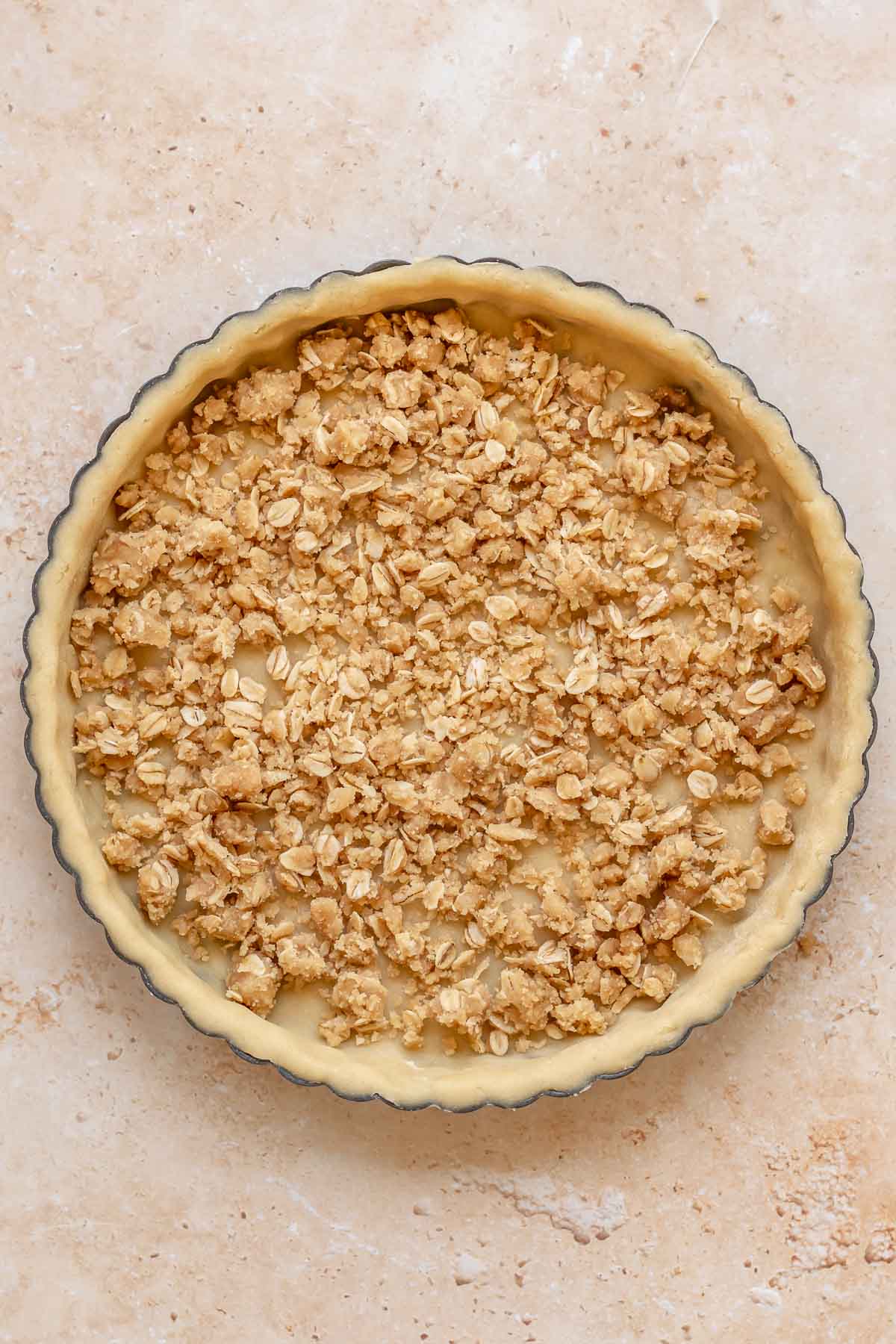 Streusel topping in a pastry shell.