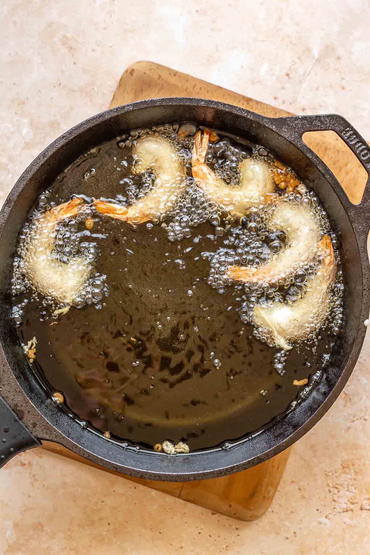 Shrimp frying in hot oil.