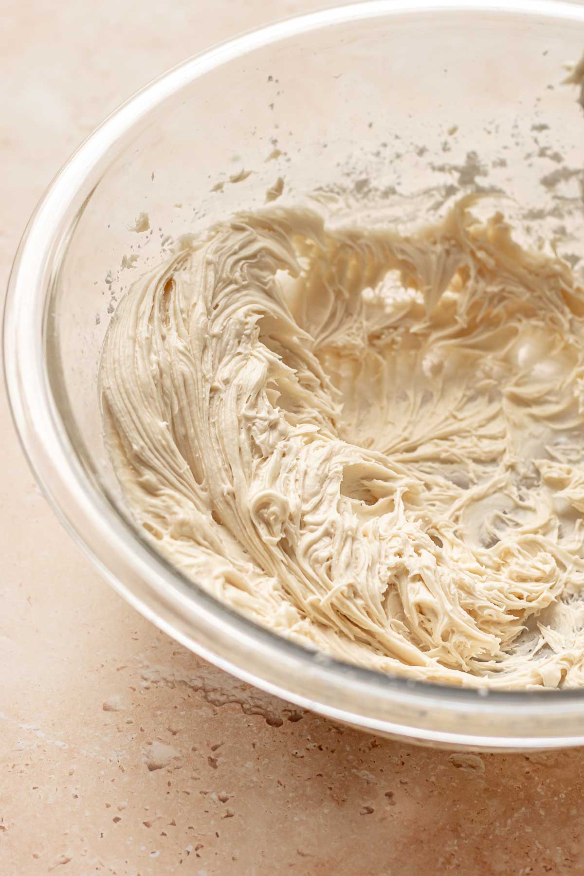 Creamed frosting in a bowl.