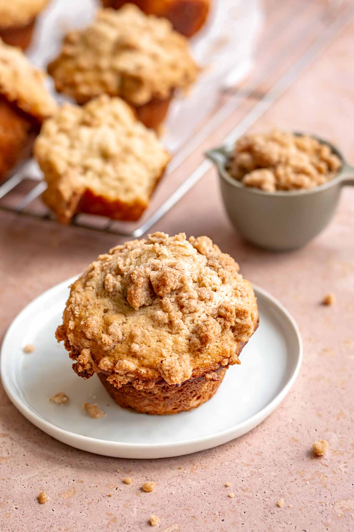 Cinnamon streusel muffin on a plate.