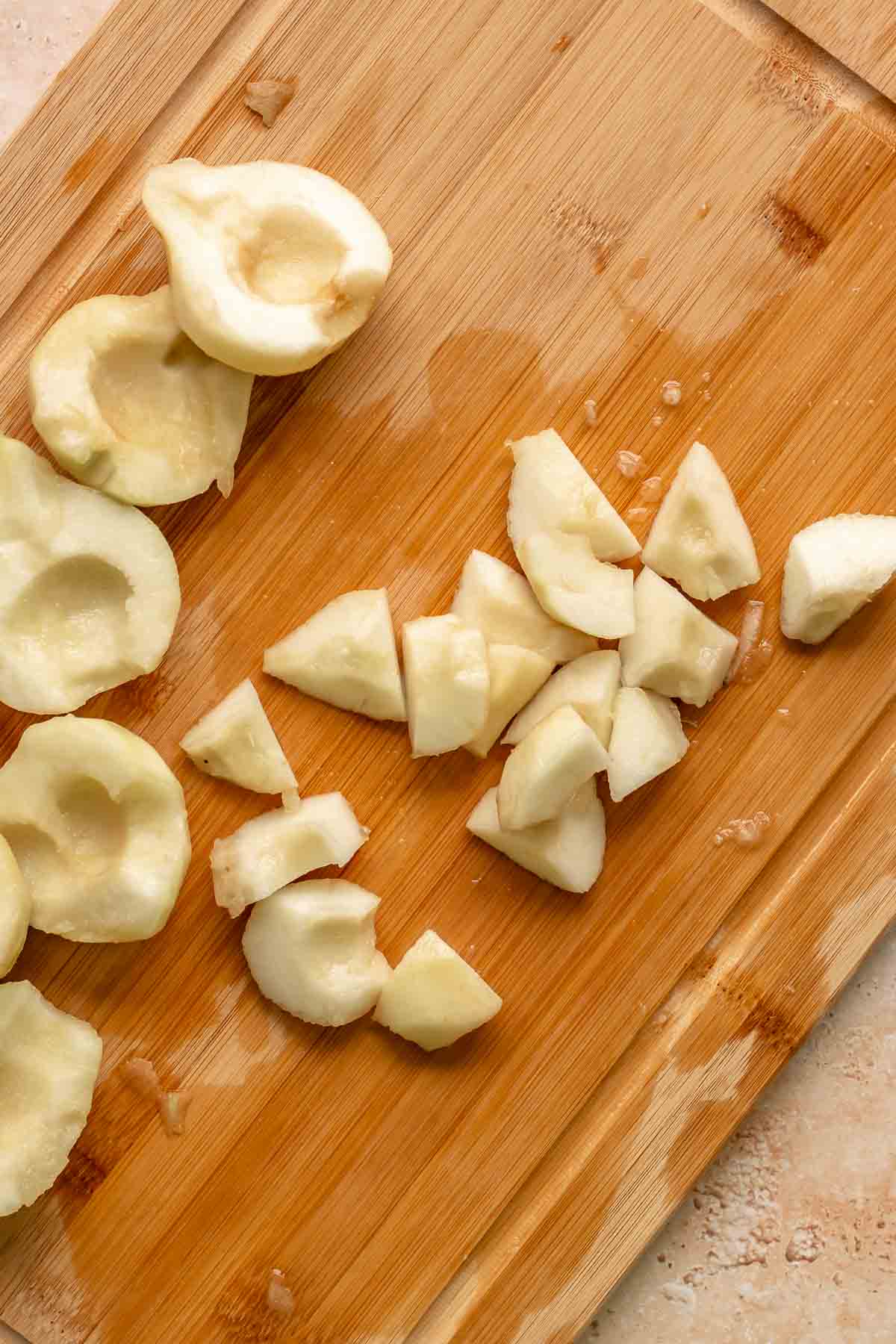 Chopped pears on a cutting board.