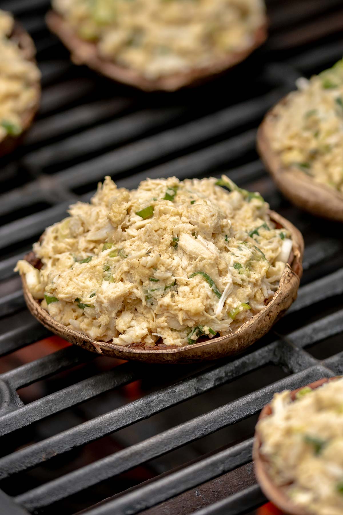 Mushrooms with crab in a grill.