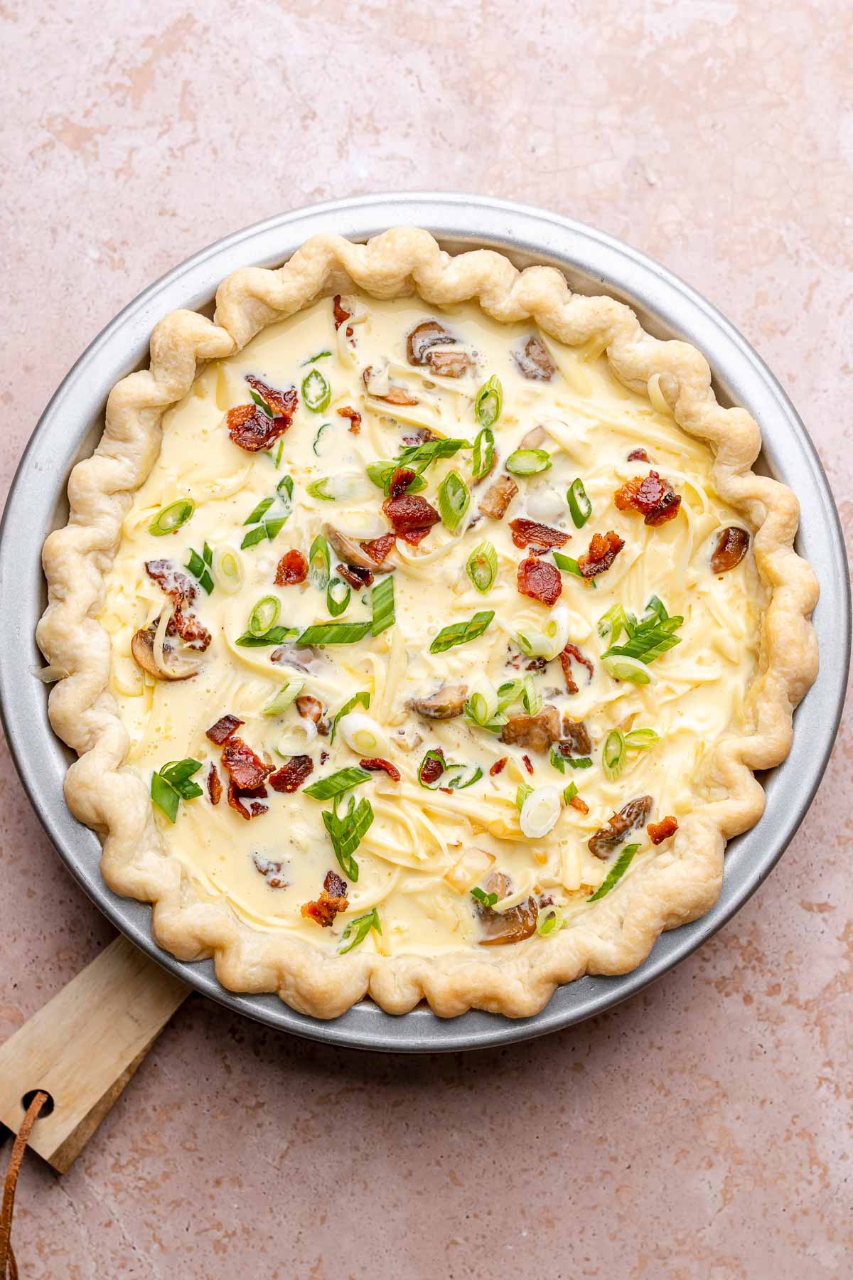 Assembled quiche before being baked.