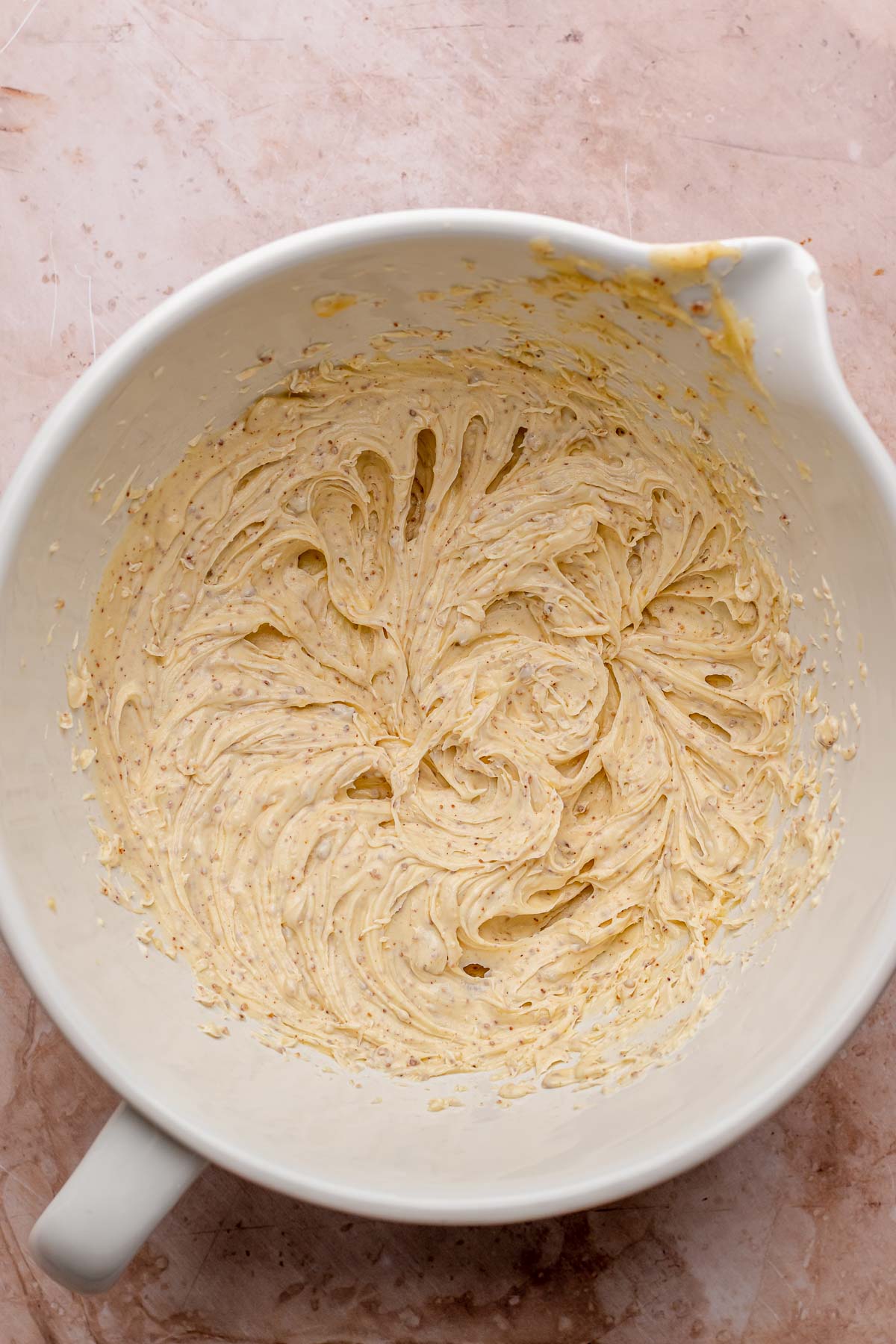 Whipped brown butter in a bowl.