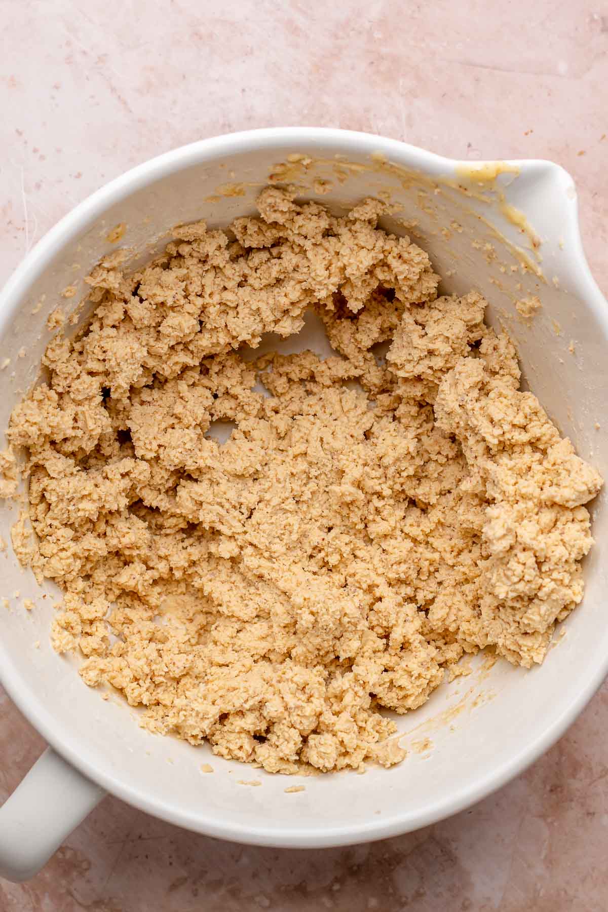 Brown butter shortbread dough in a bowl.