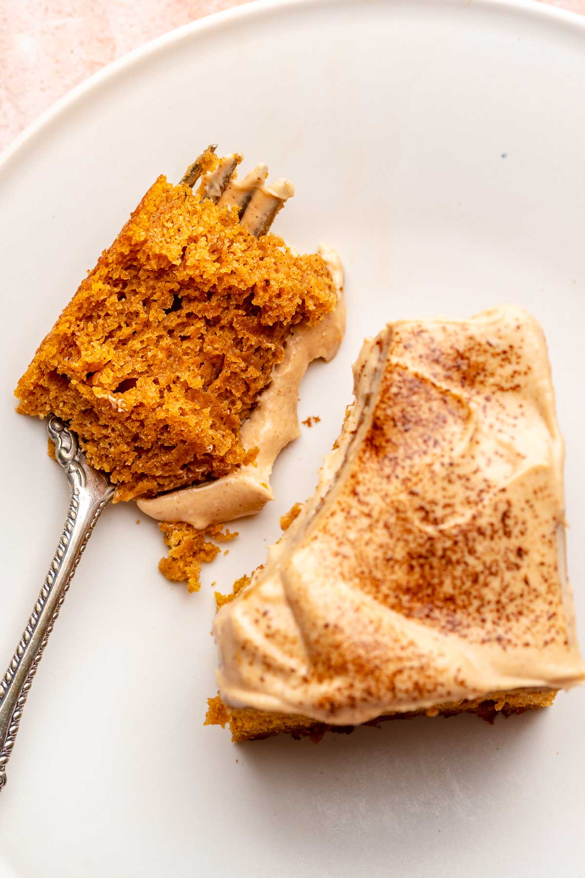 Pumpkin spice latte cake with a bite removed sitting on a fork.