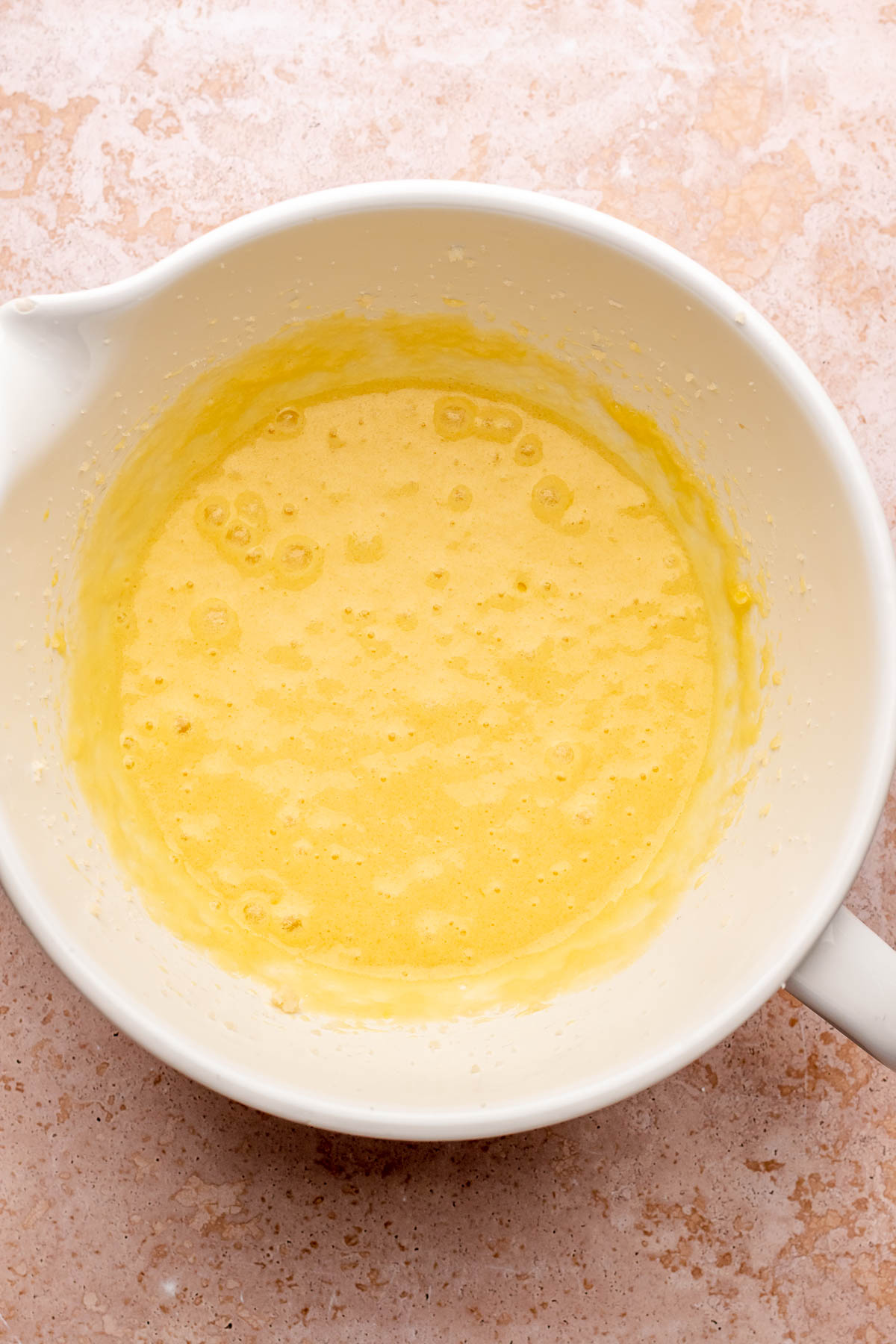 Creamed cake batter in a bowl.