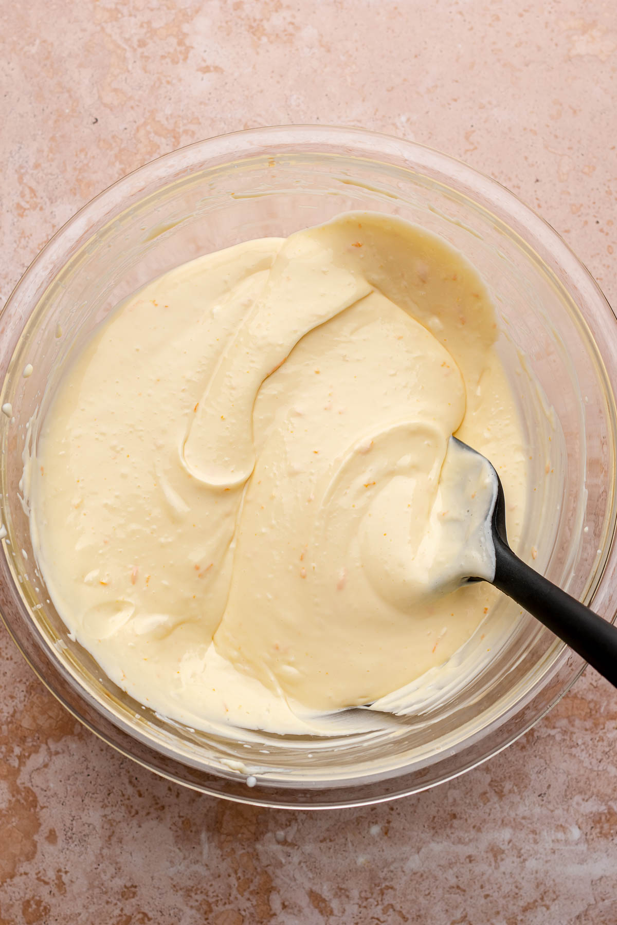 Finished cheesecake batter in a bowl.
