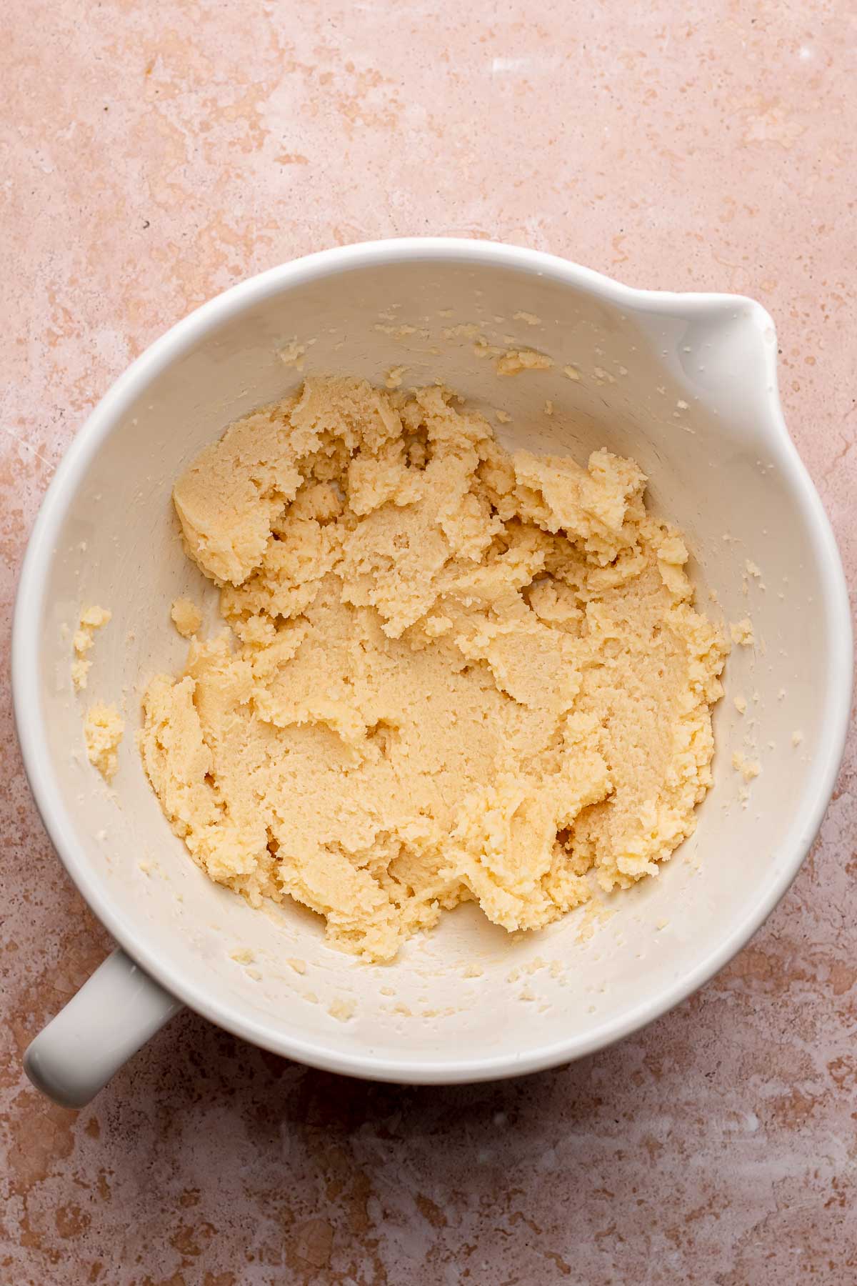 Creamed butter and sugar in a bowl.