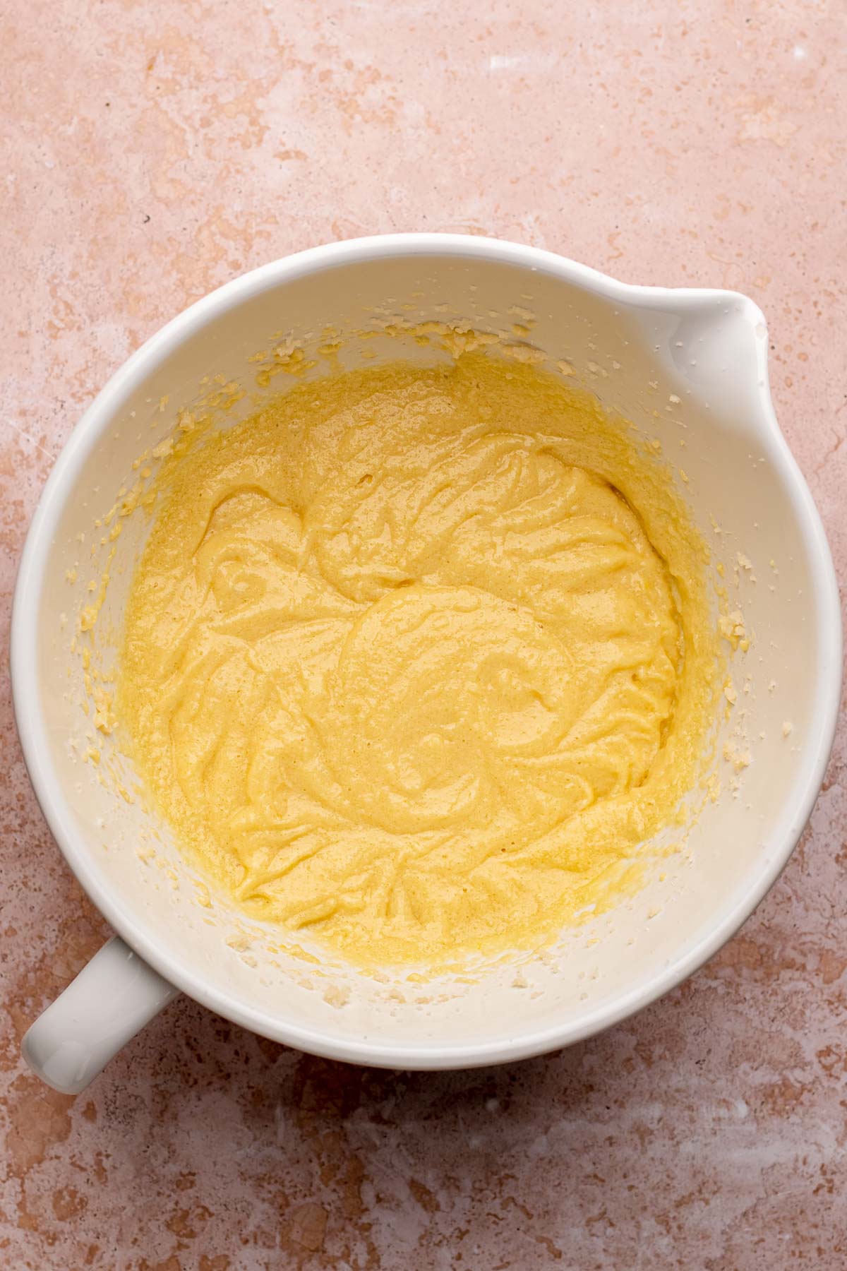 Creamed wet ingredients in a mixing bowl.