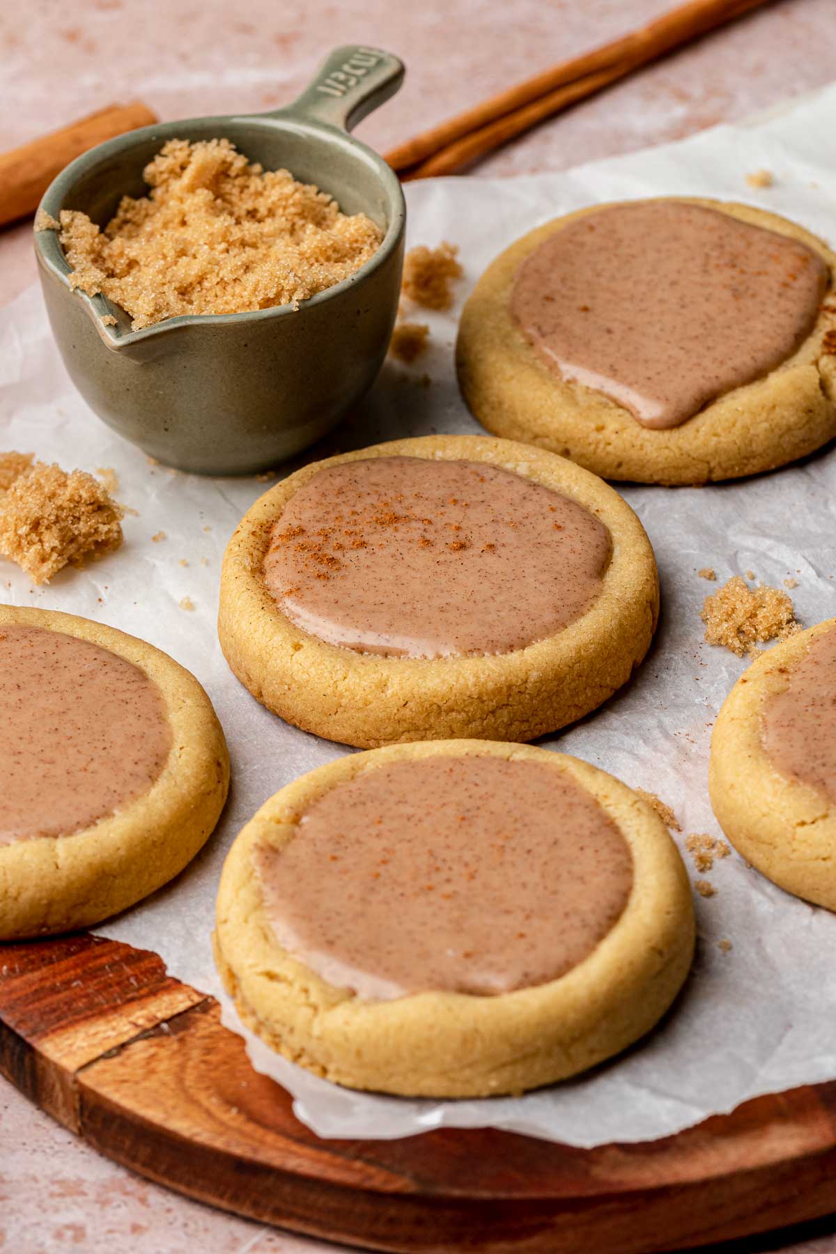 Finished brown sugar pop tart cookies on parchment paper.