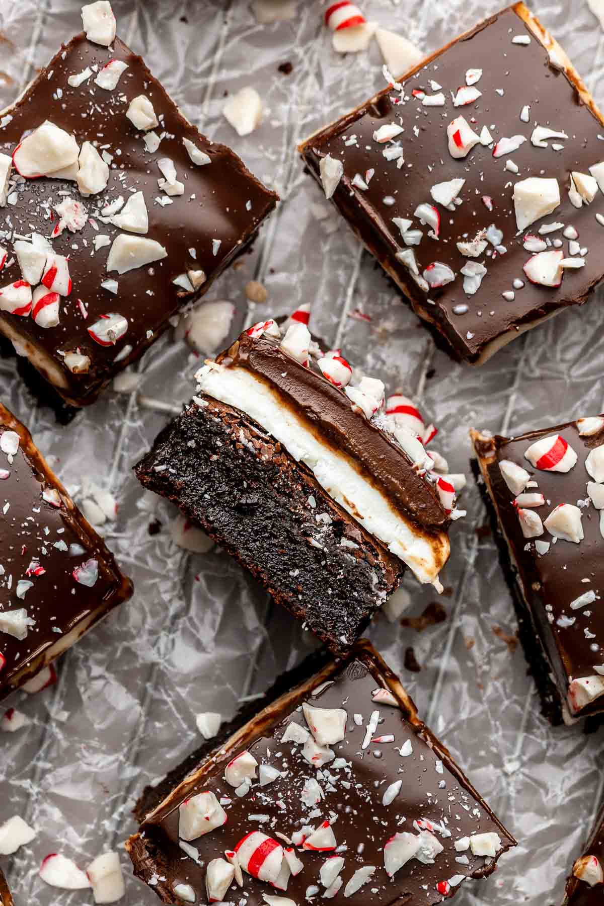 Sliced peppermint brownies with one laying on its side.
