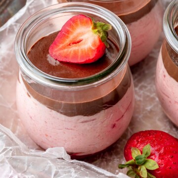 Chocolate strawberry mousse in a glass jar.