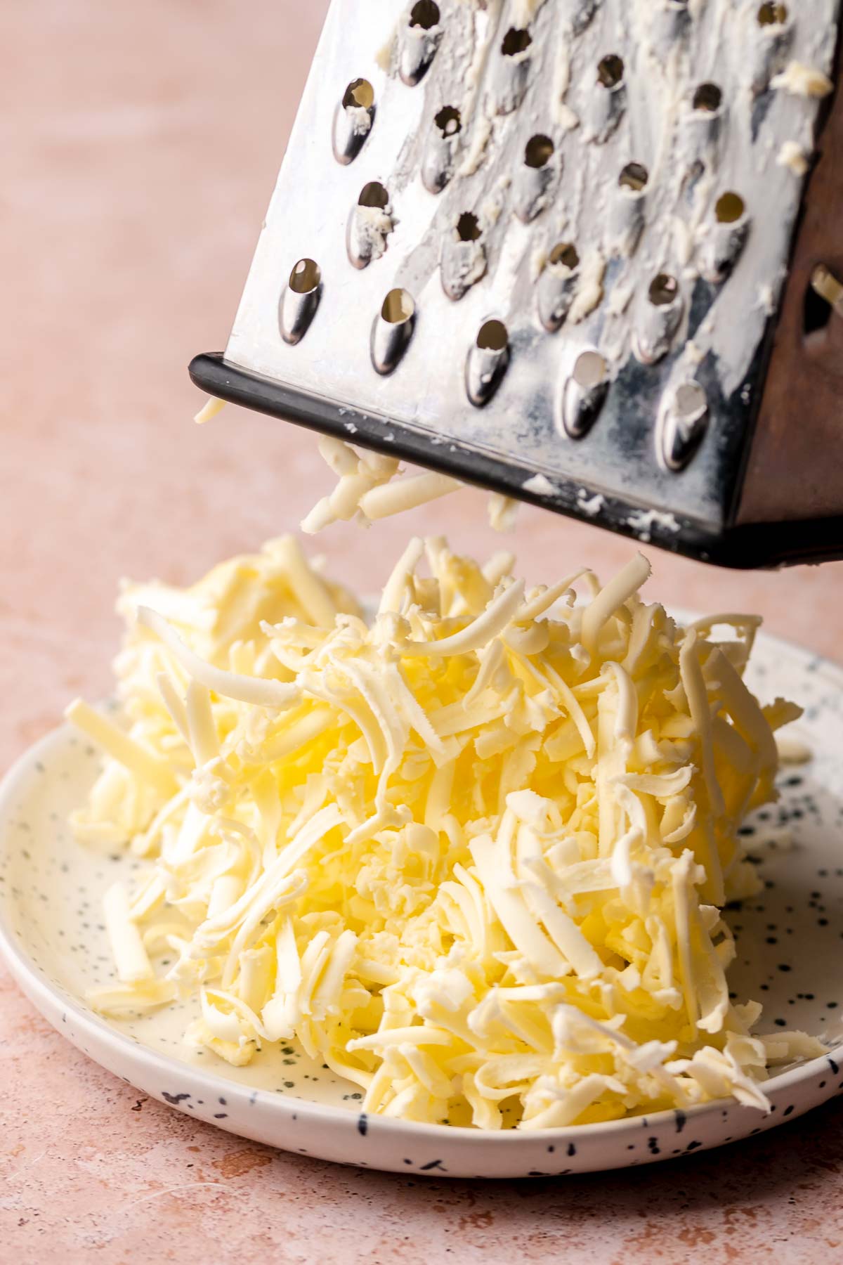 Butter grated on a box grater.