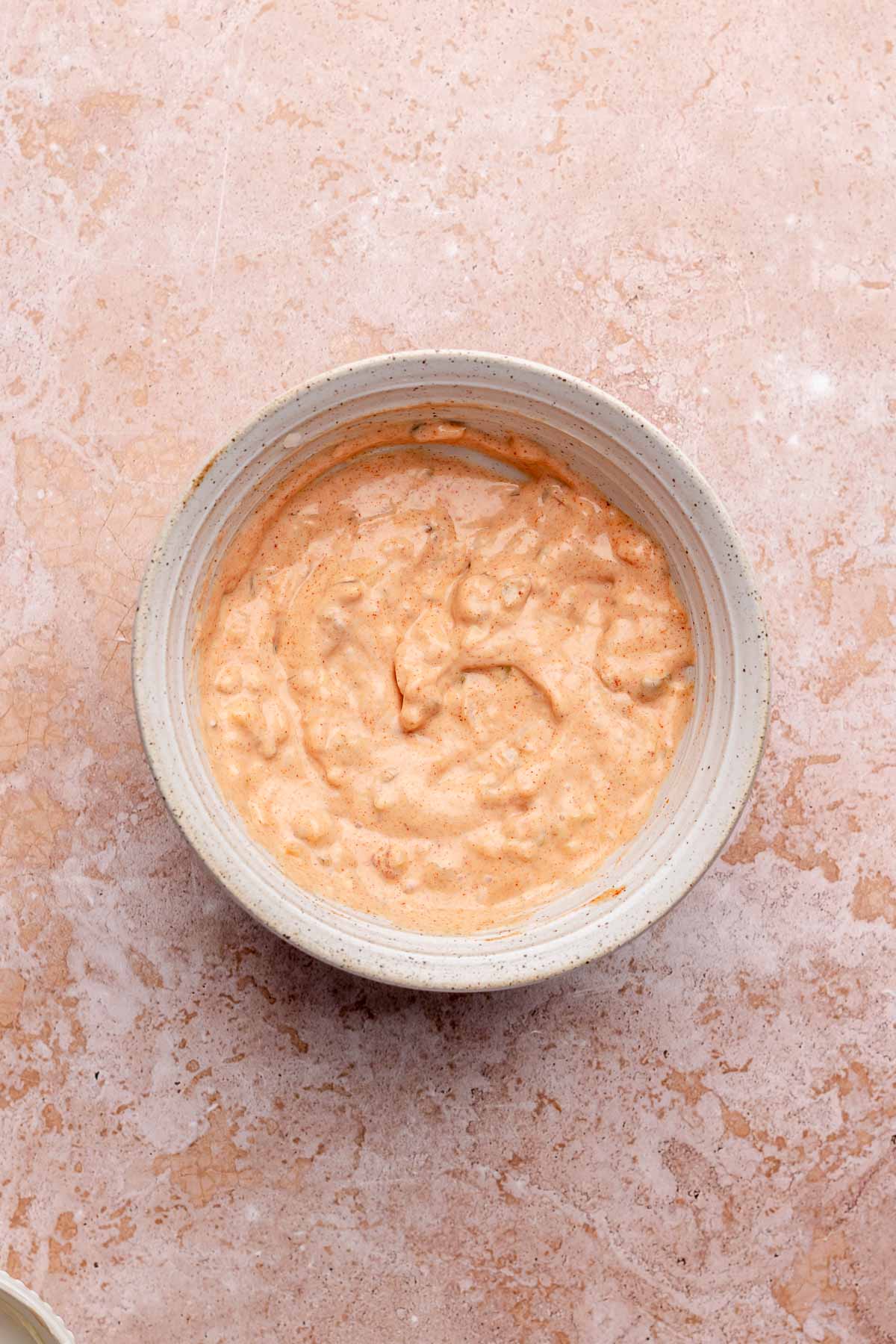 Thousand island dip mixed together in a bowl.